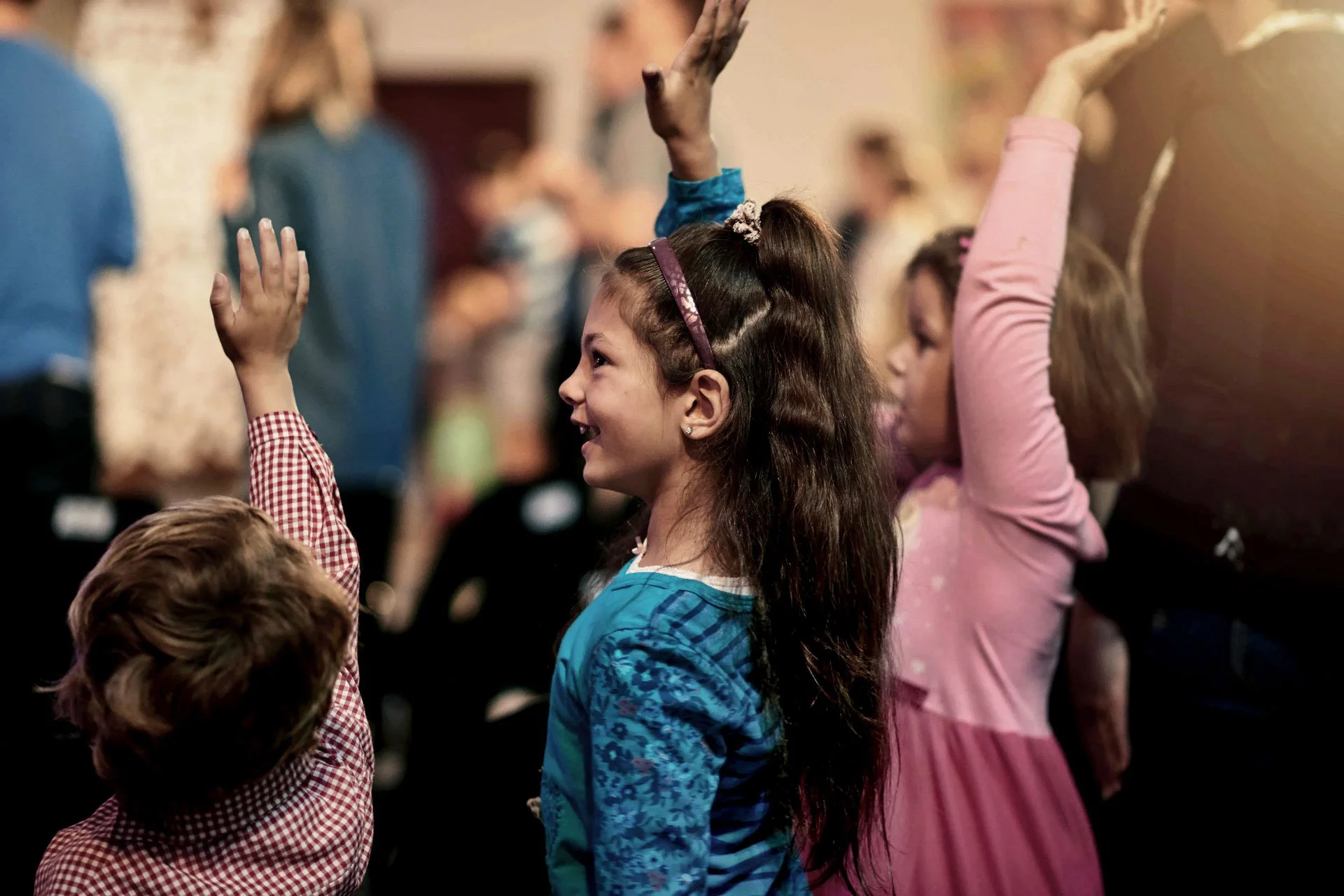 Children at church worshipping