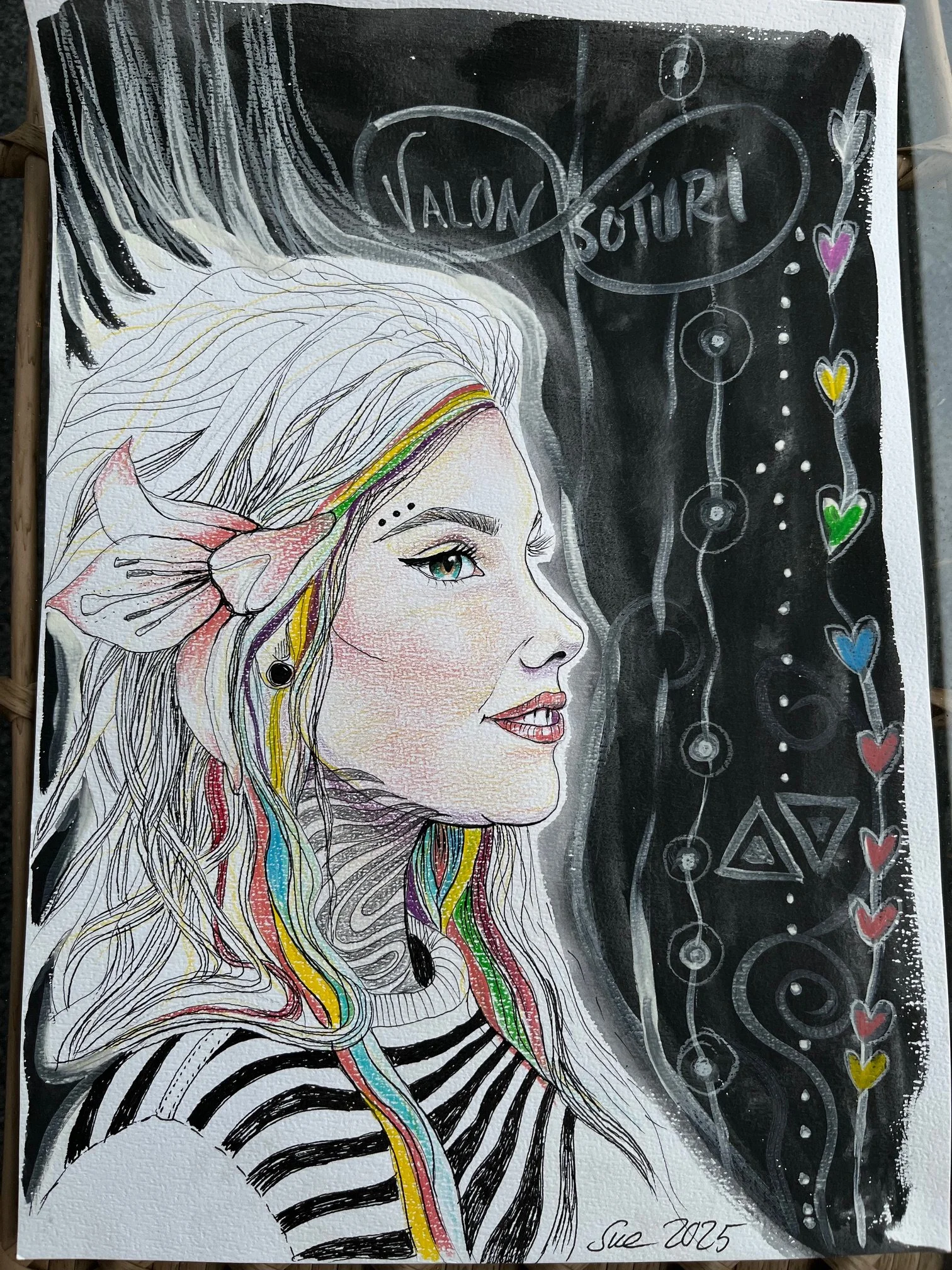 A colorful illustration of a woman with long, flowing hair accented with rainbow streaks, wearing a striped shirt, and a large bow in her hair. The background is black with decorative hearts and swirling patterns, and text reading at the top. The art