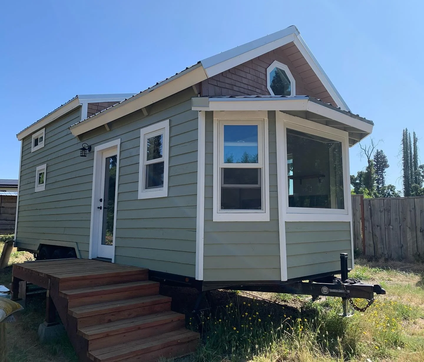 Finally posting some photos of our finished tiny house! This was a labor of love from start to finish. We designed it with maximum storage and functionality in mind, with a full kitchen, breakfast nook, bathroom, laundry, and bedroom loft. We built t