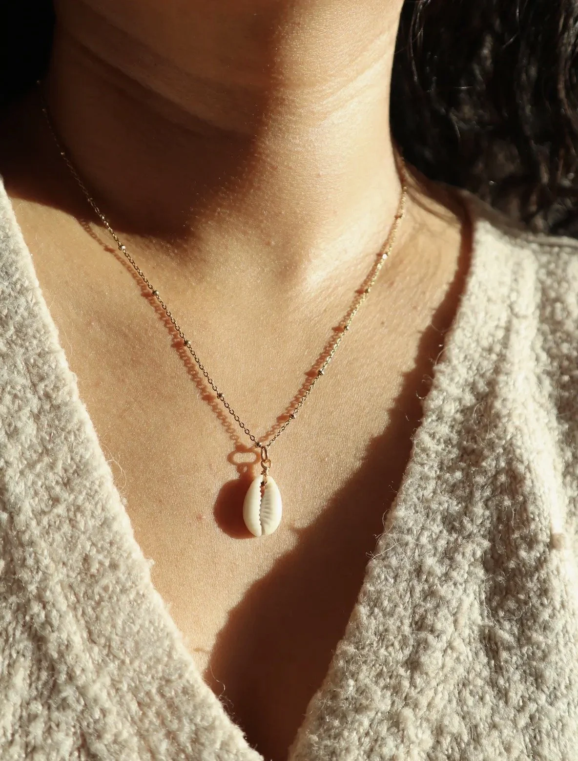 Cowrie shell pendant gold necklace