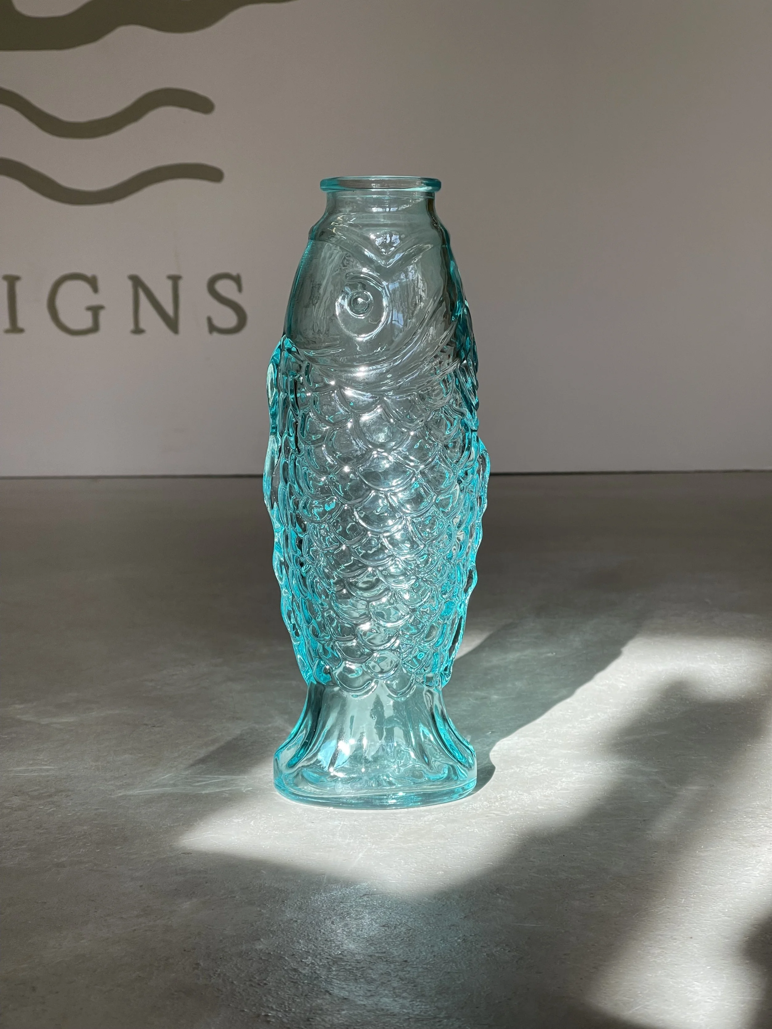 Blue glass fish vase