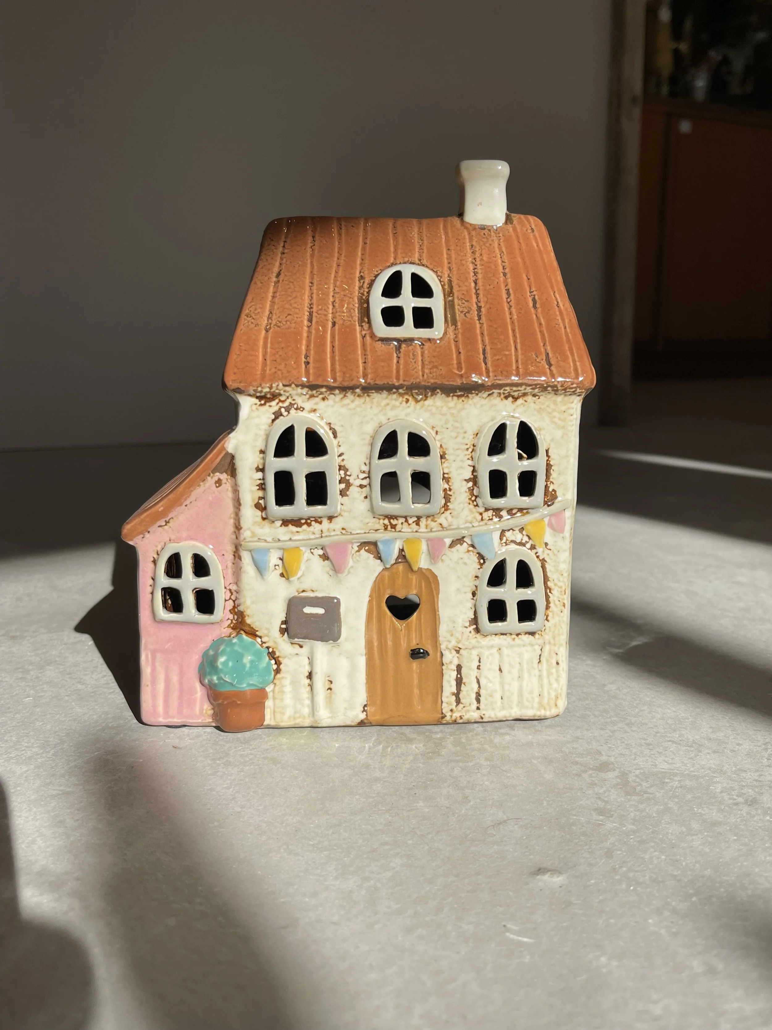 Pink and cream bunting ceramic house
