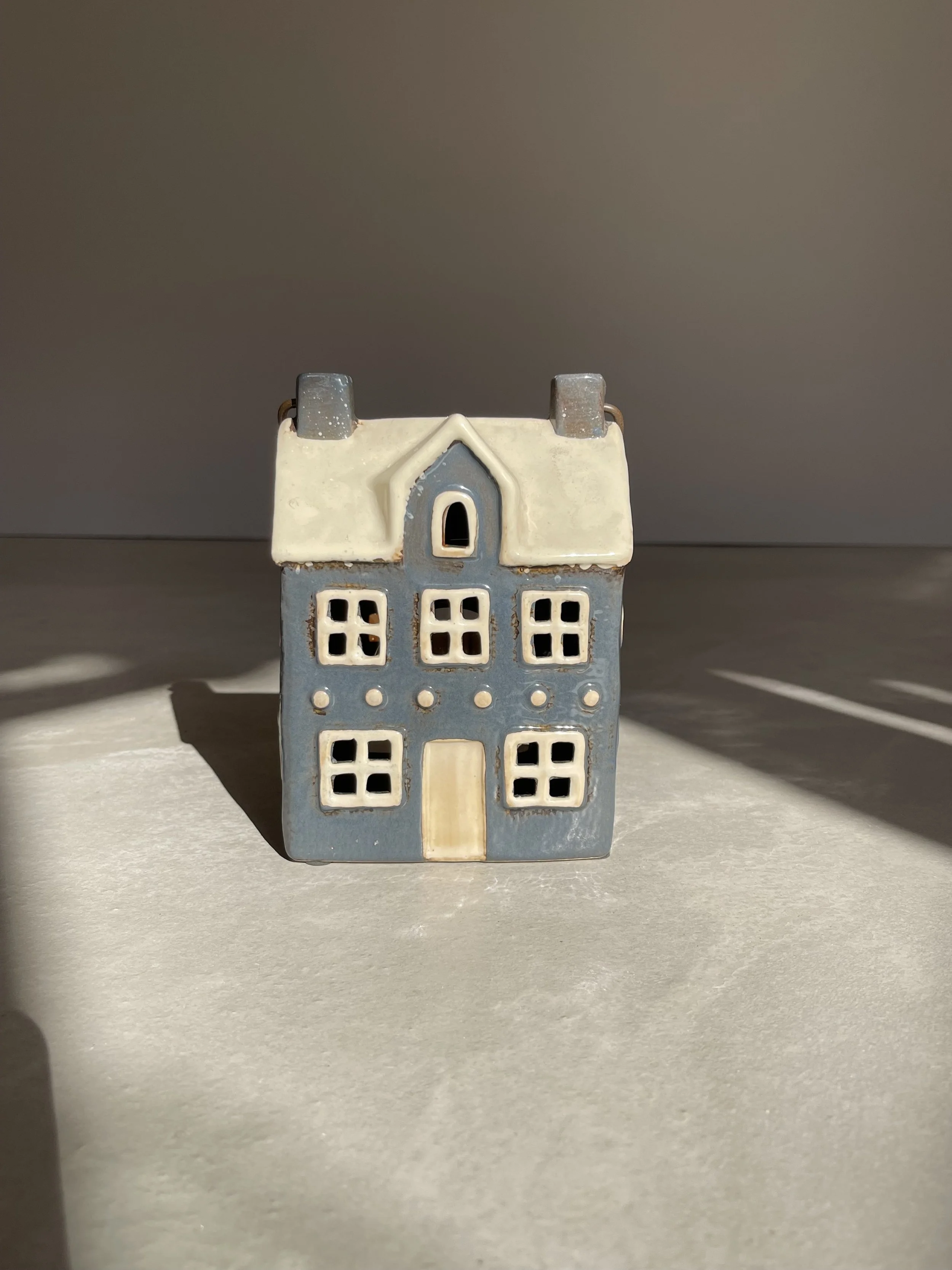 Charcoal grey ceramic house
