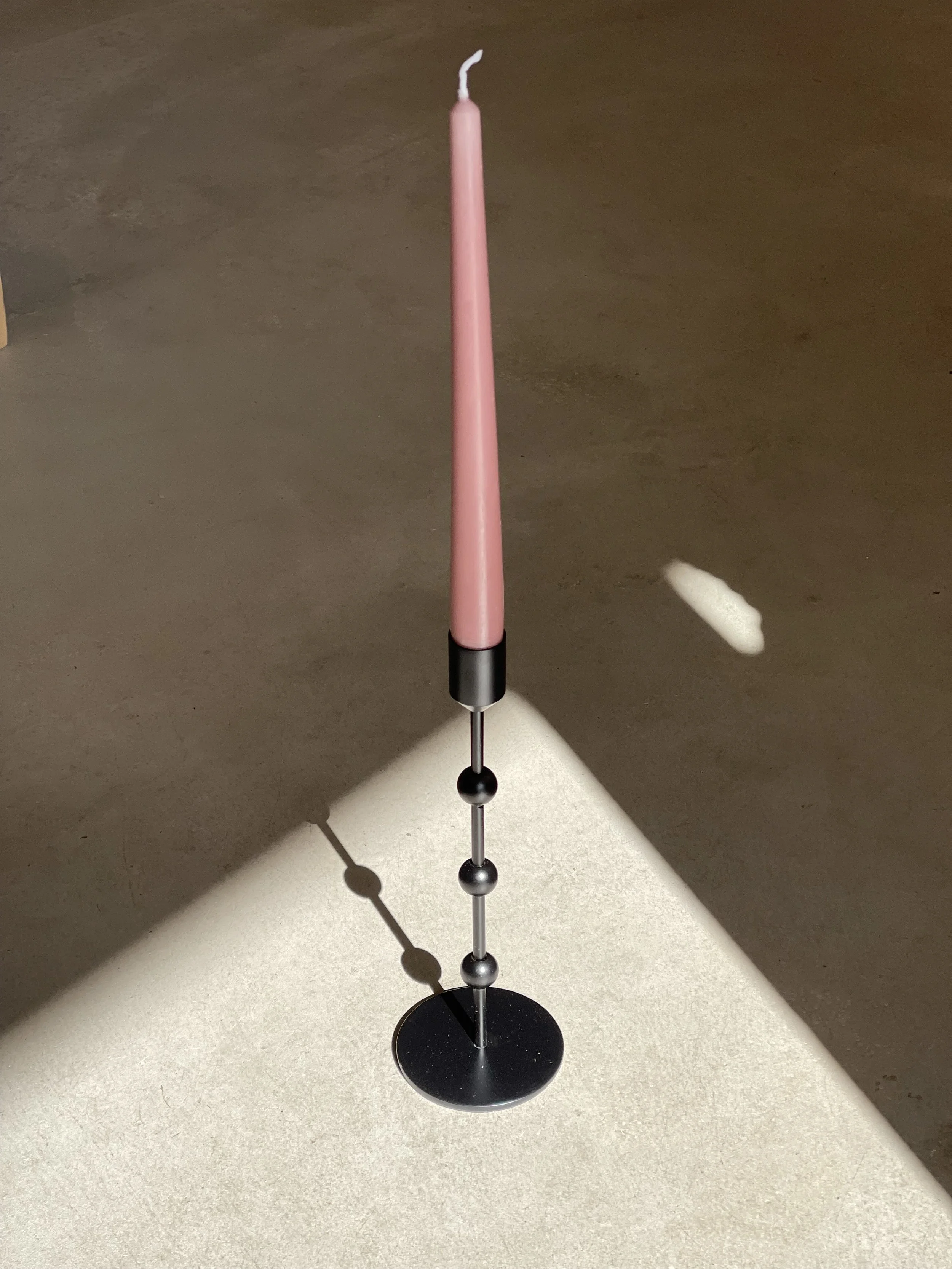 Black metal candlestick holder