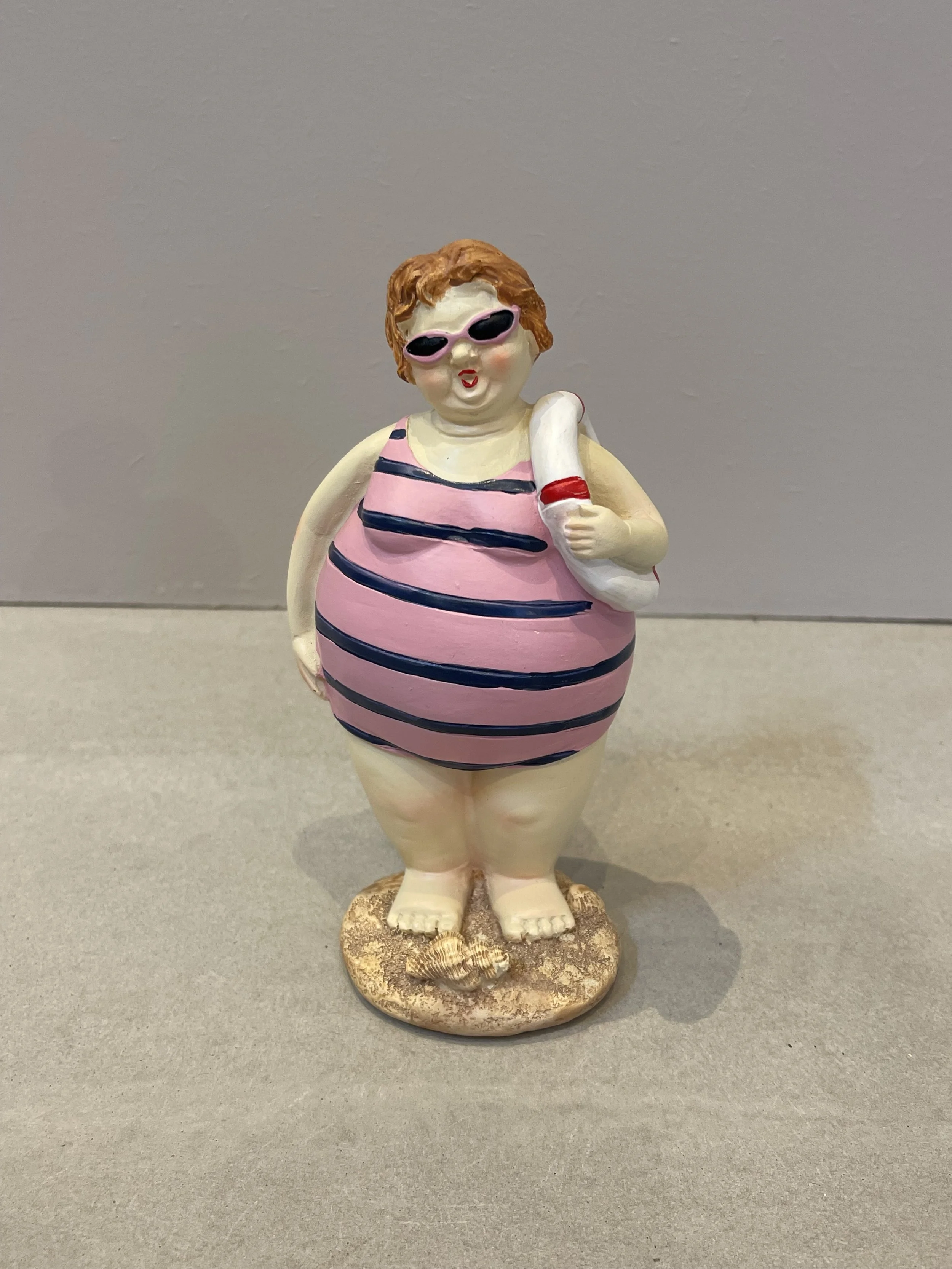 Beach lady with lifebuoy