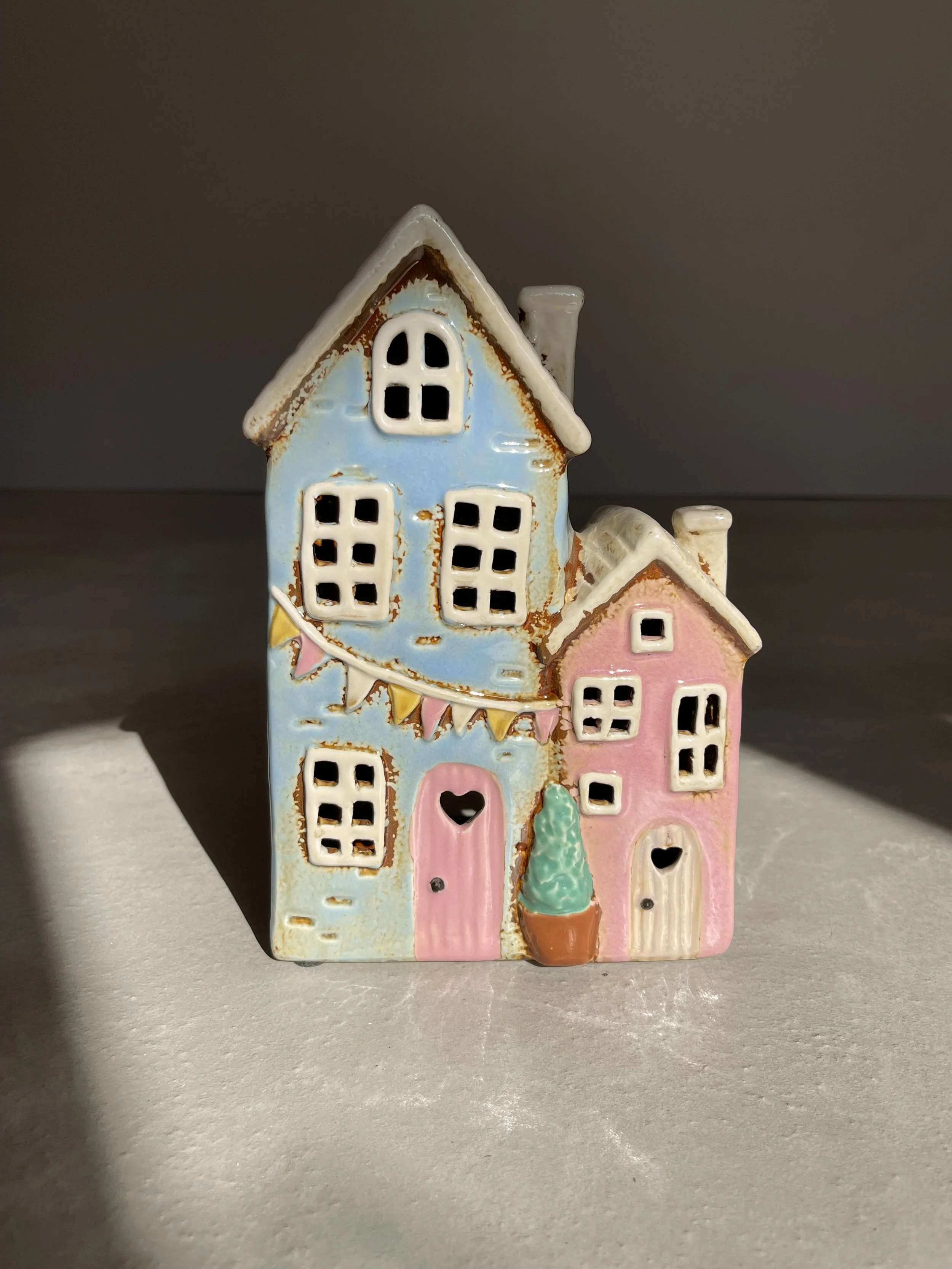 Blue and pink bunting ceramic house