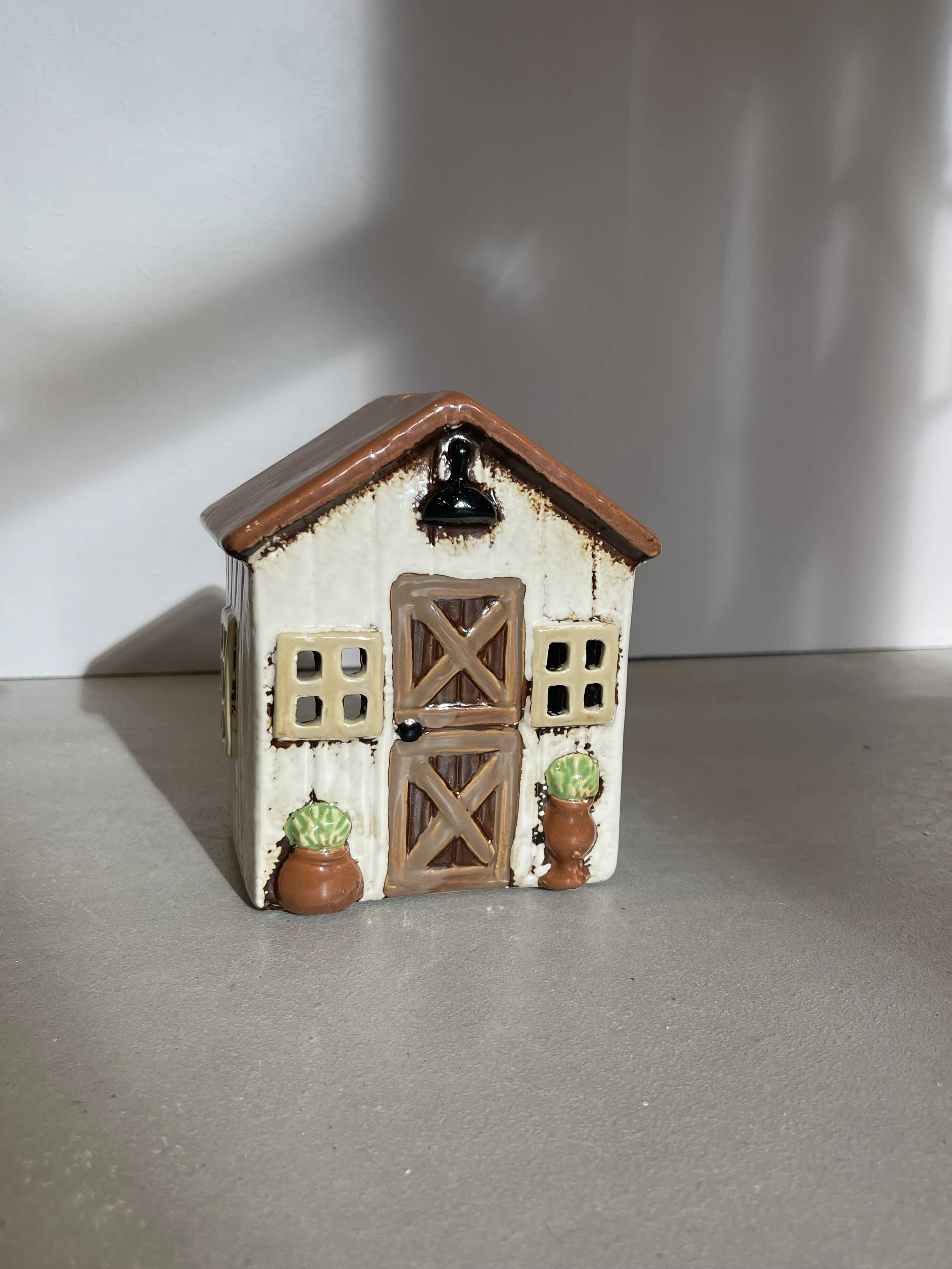 Cream rustic ceramic house brown door