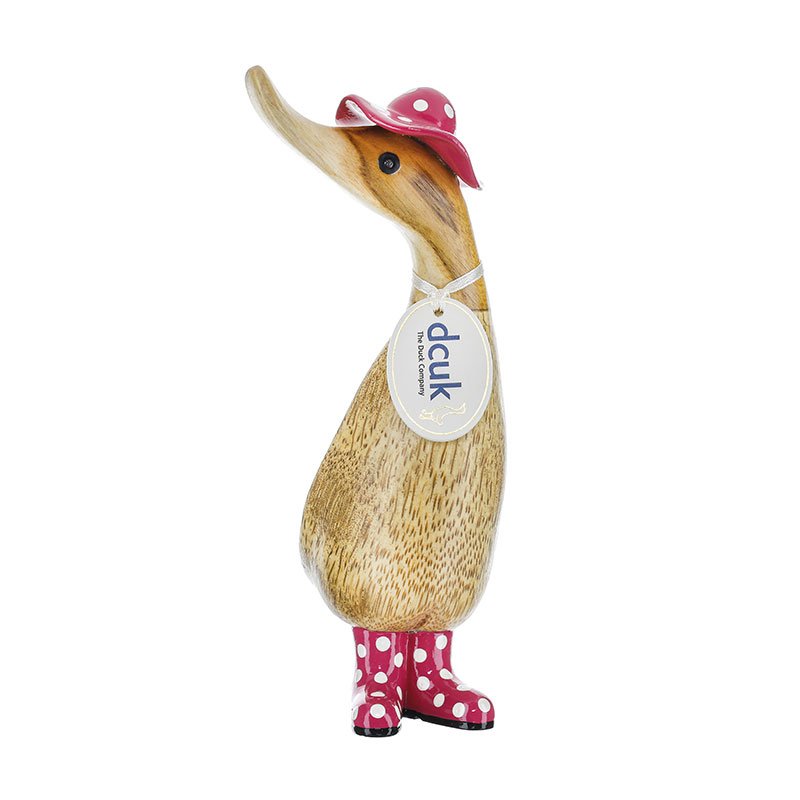 Pink spotty hat and welly boots duck
