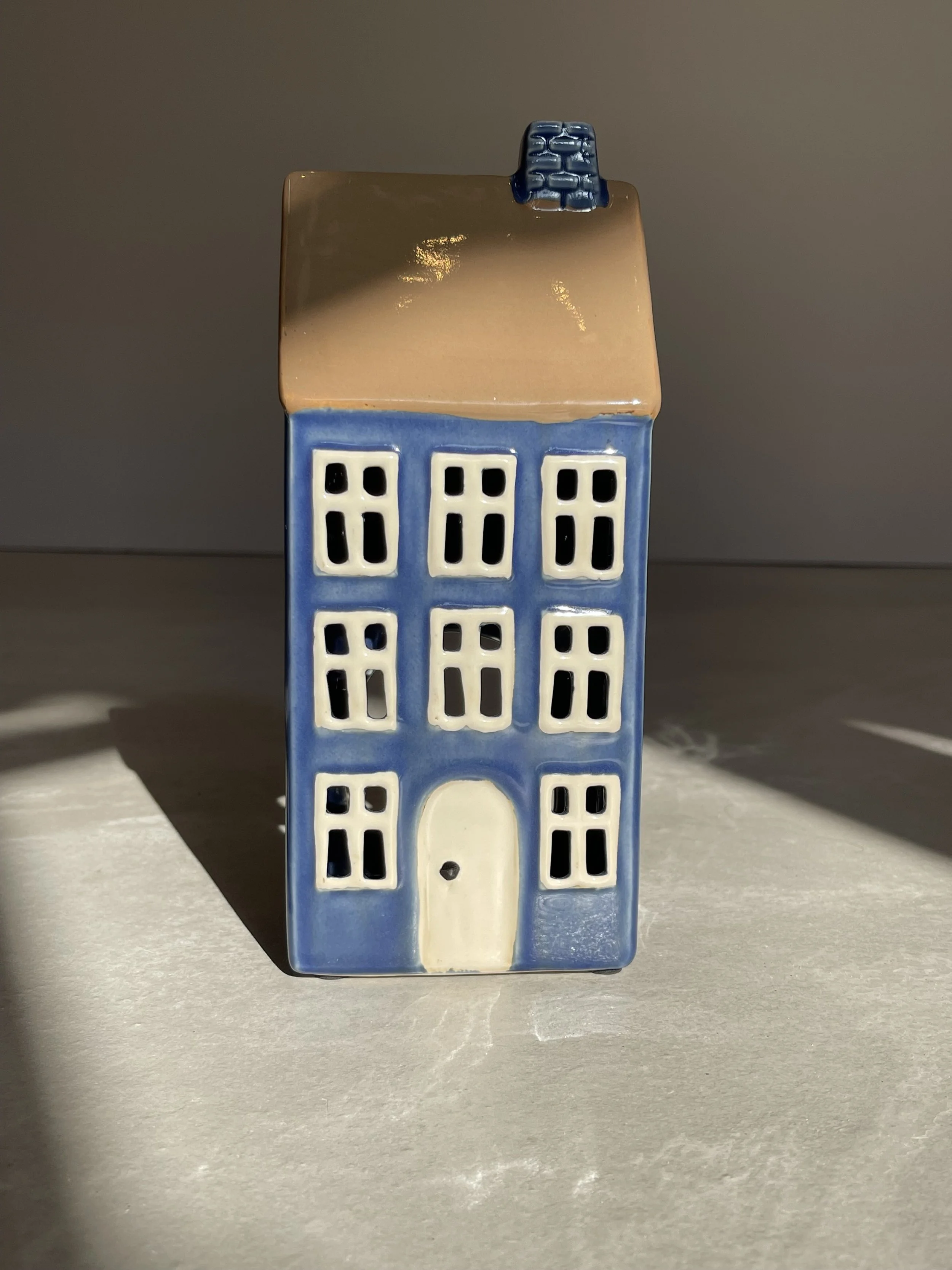 Deep blue ceramic house tea light holder