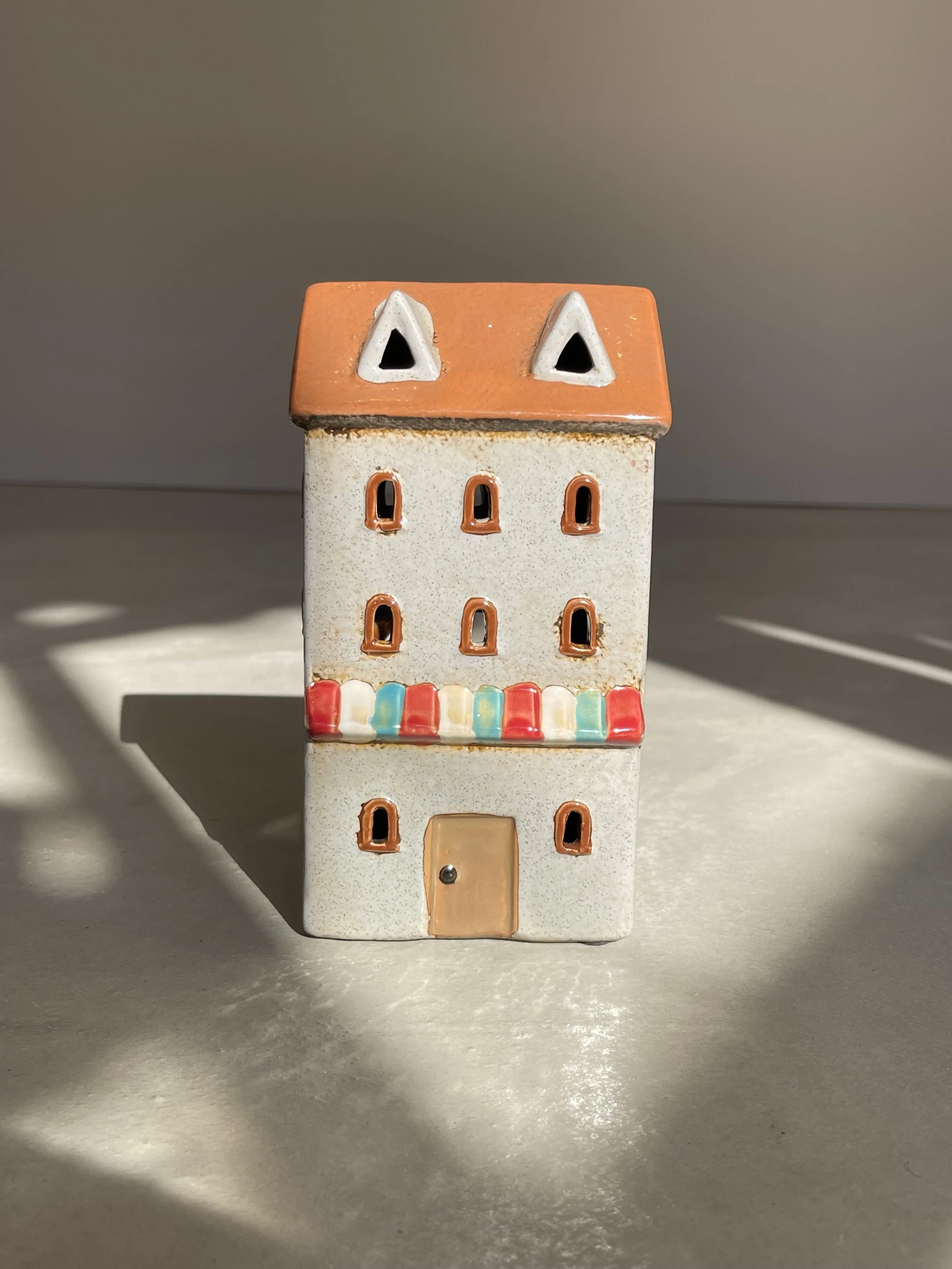 Grey ceramic townhouse