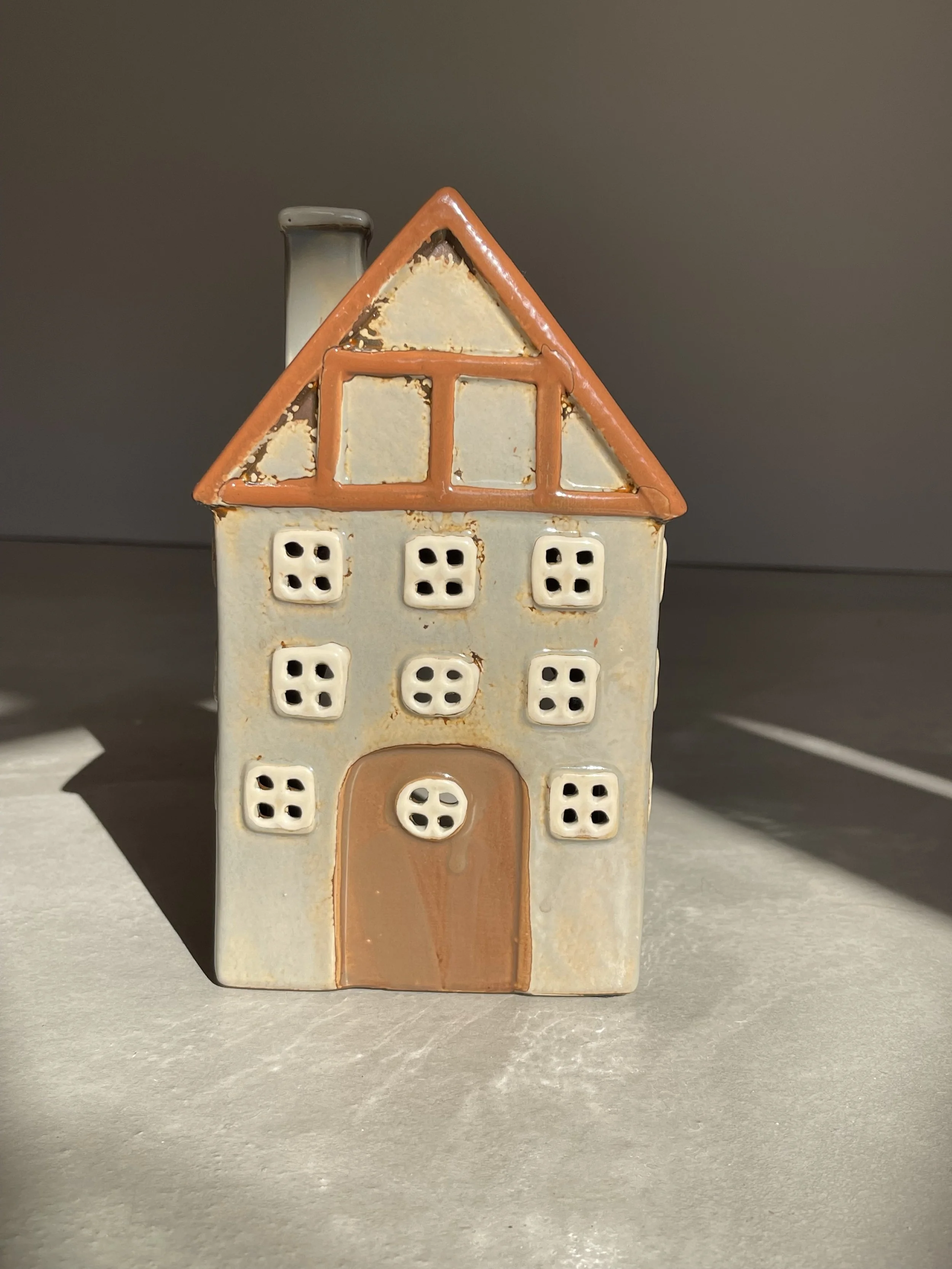 Grey ceramic house