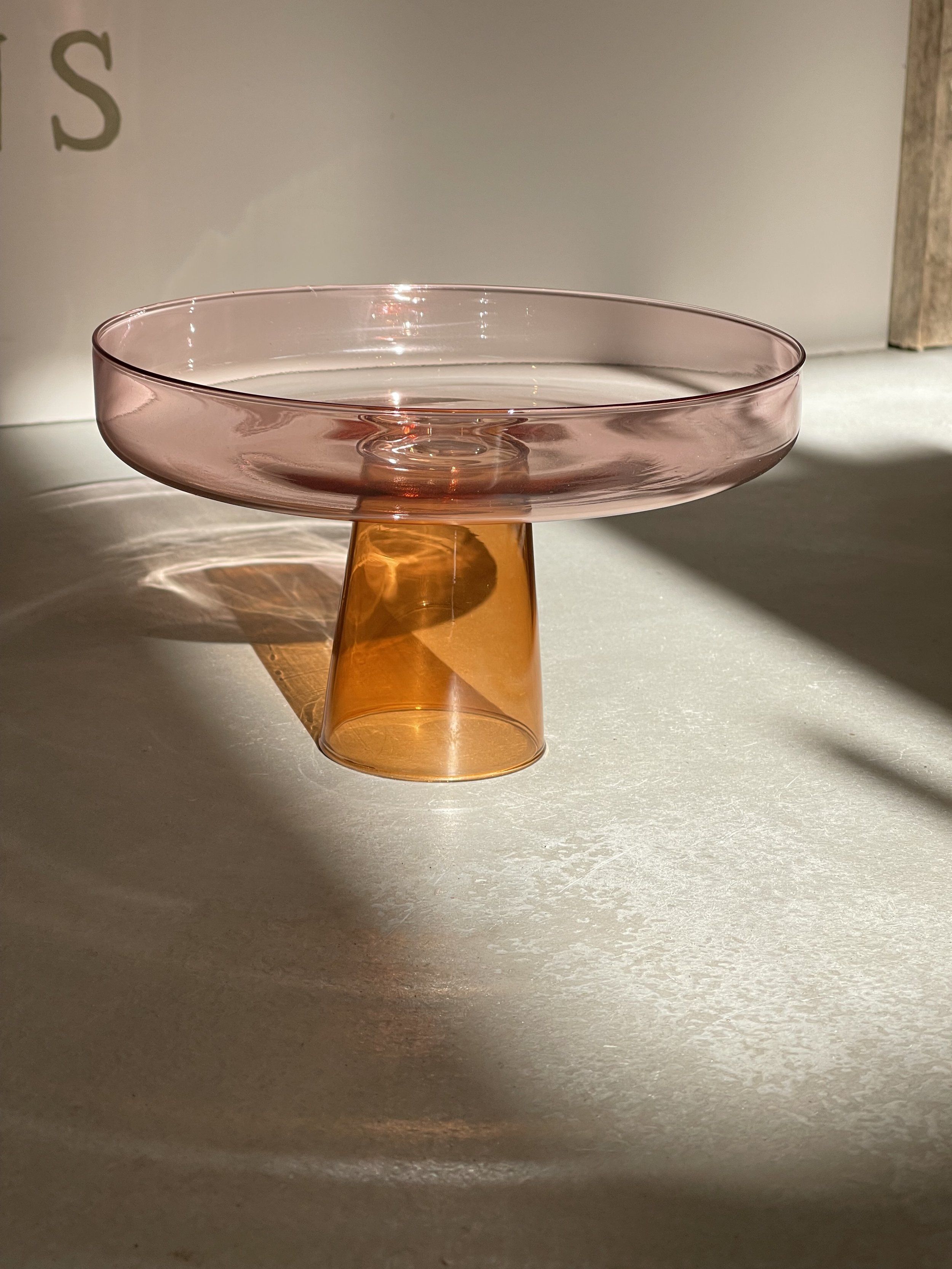 Pink and orange glass cake stand