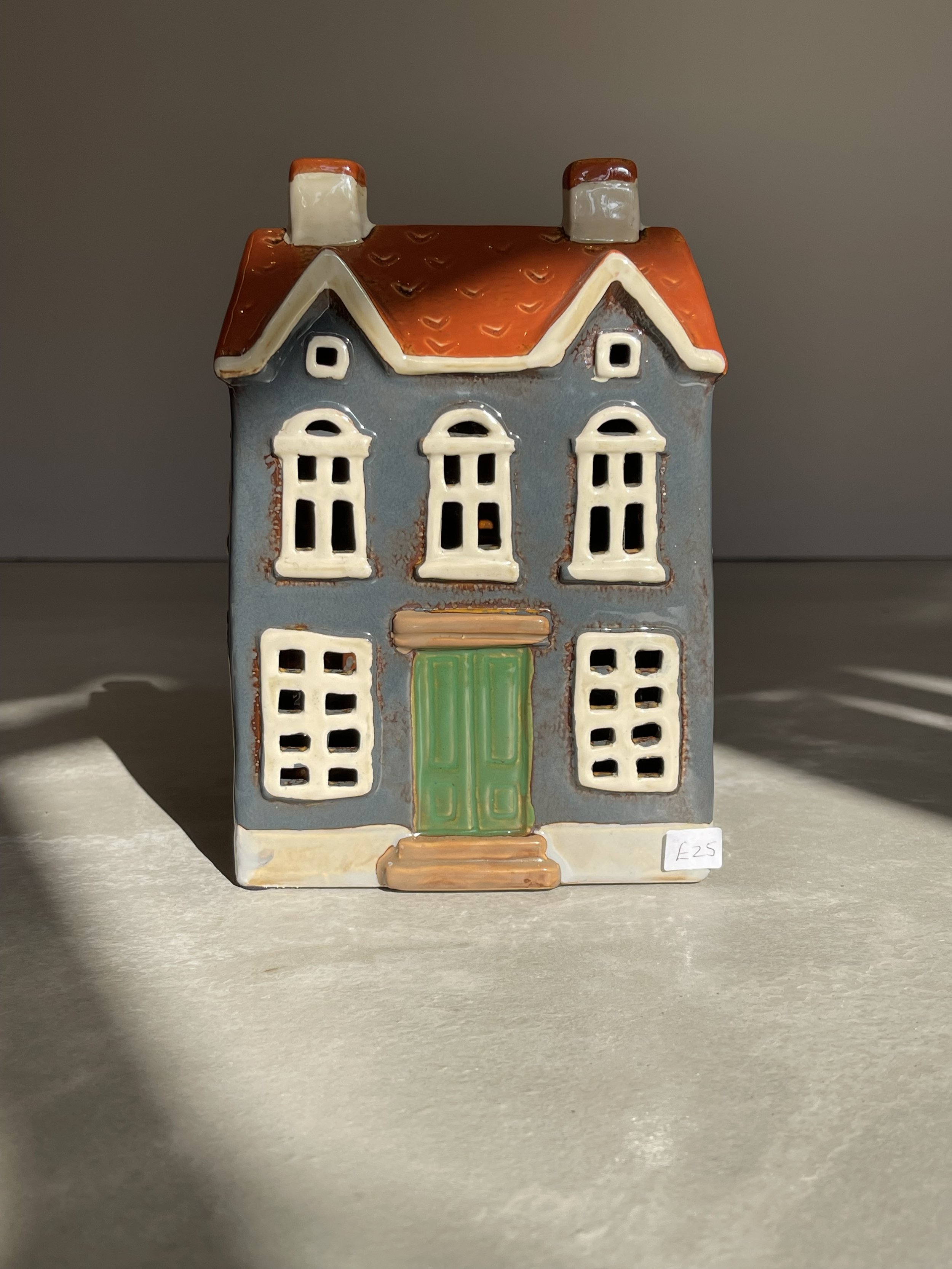 Charcoal grey and green ceramic house