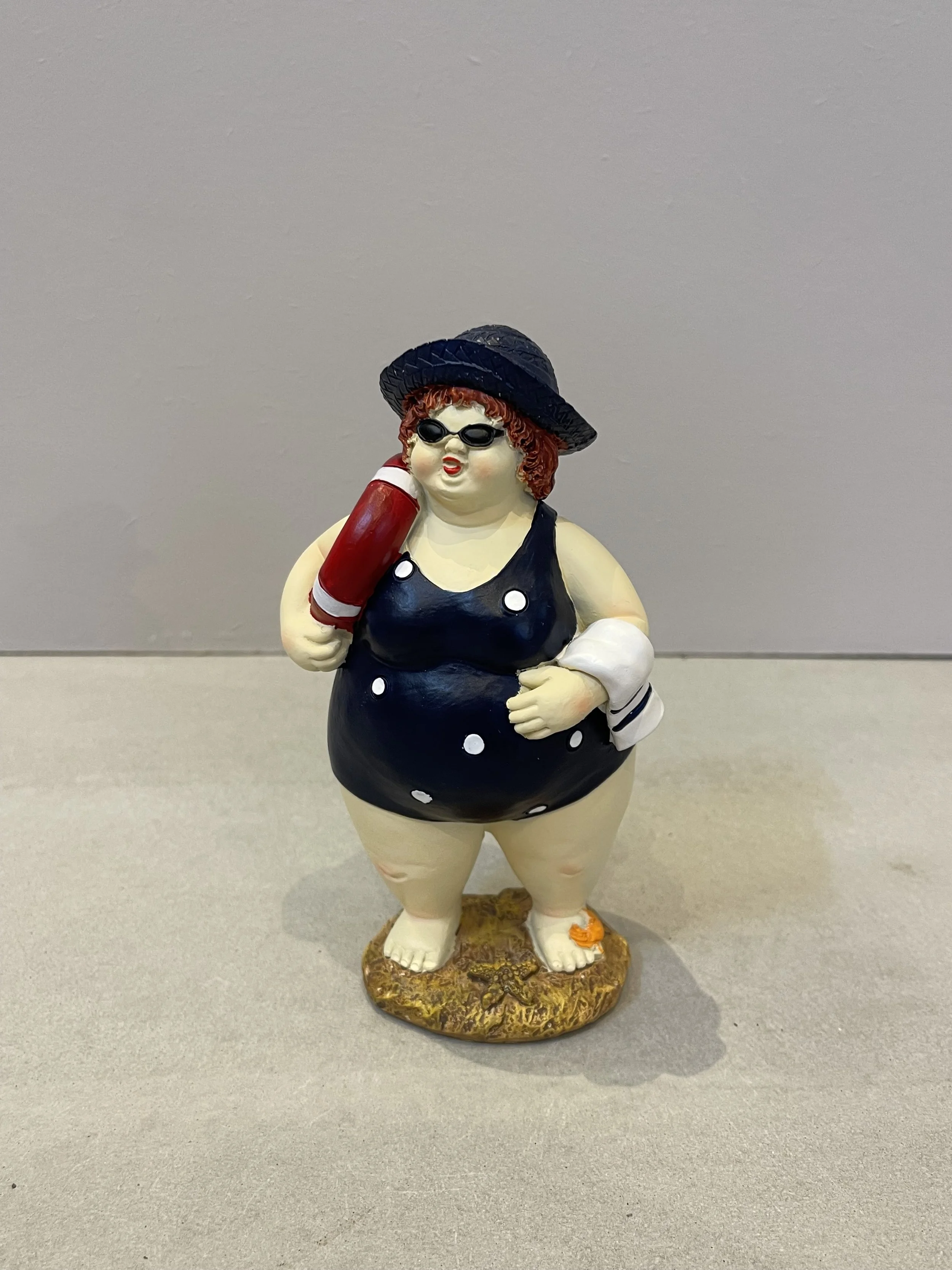 Beach lady with lifebuoy