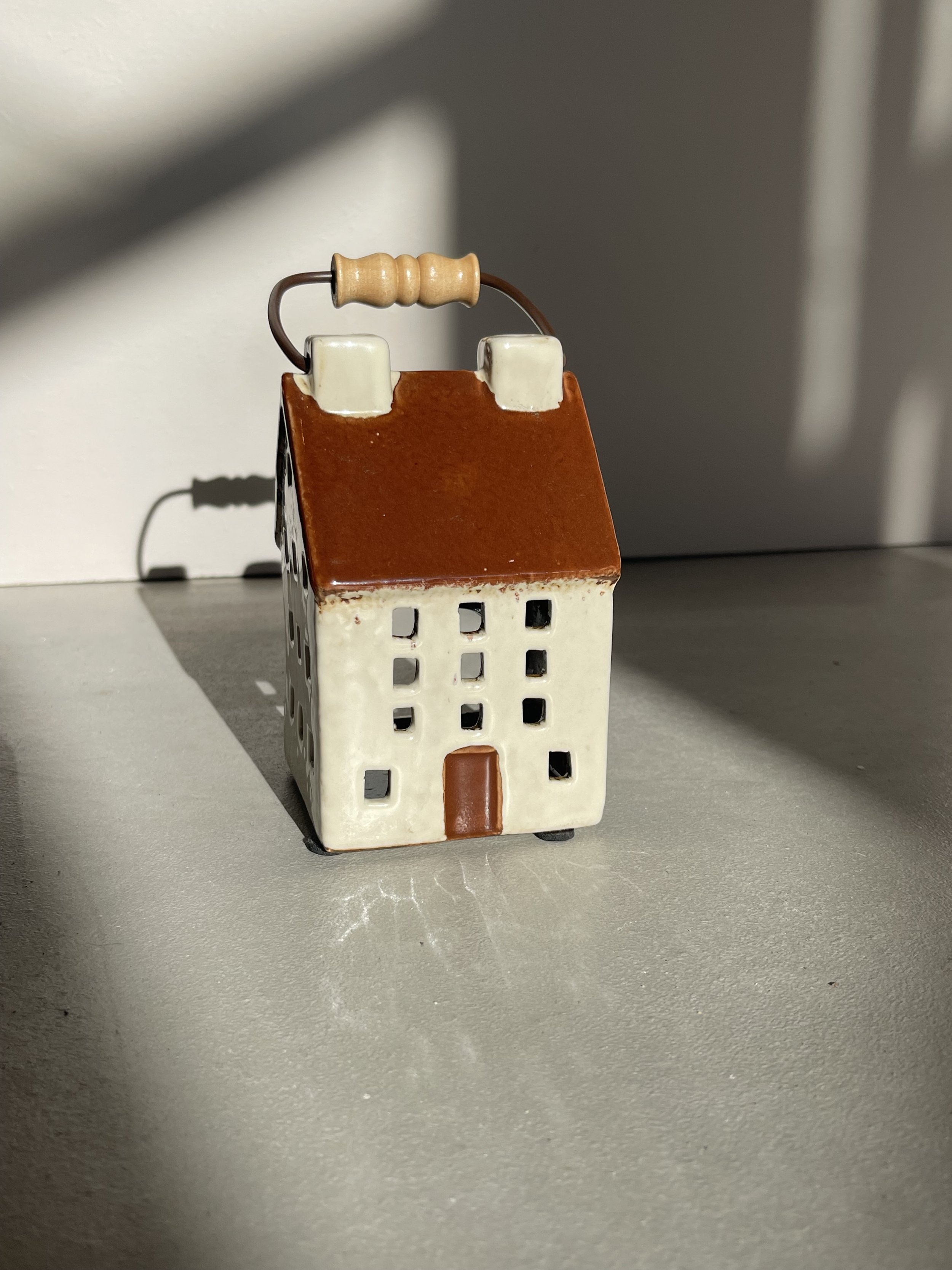 Small cream ceramic house