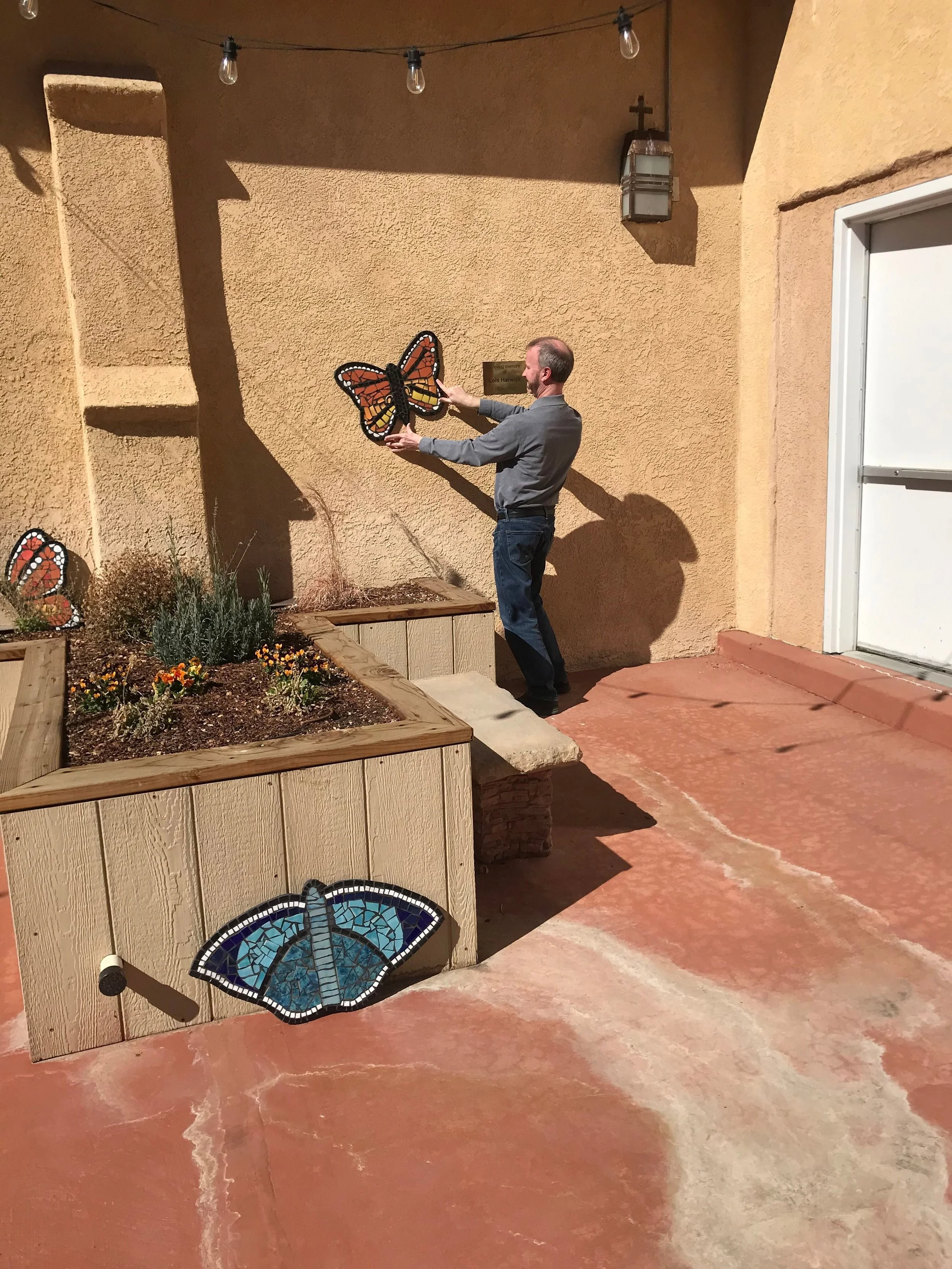 Butterly mosaics from group classes