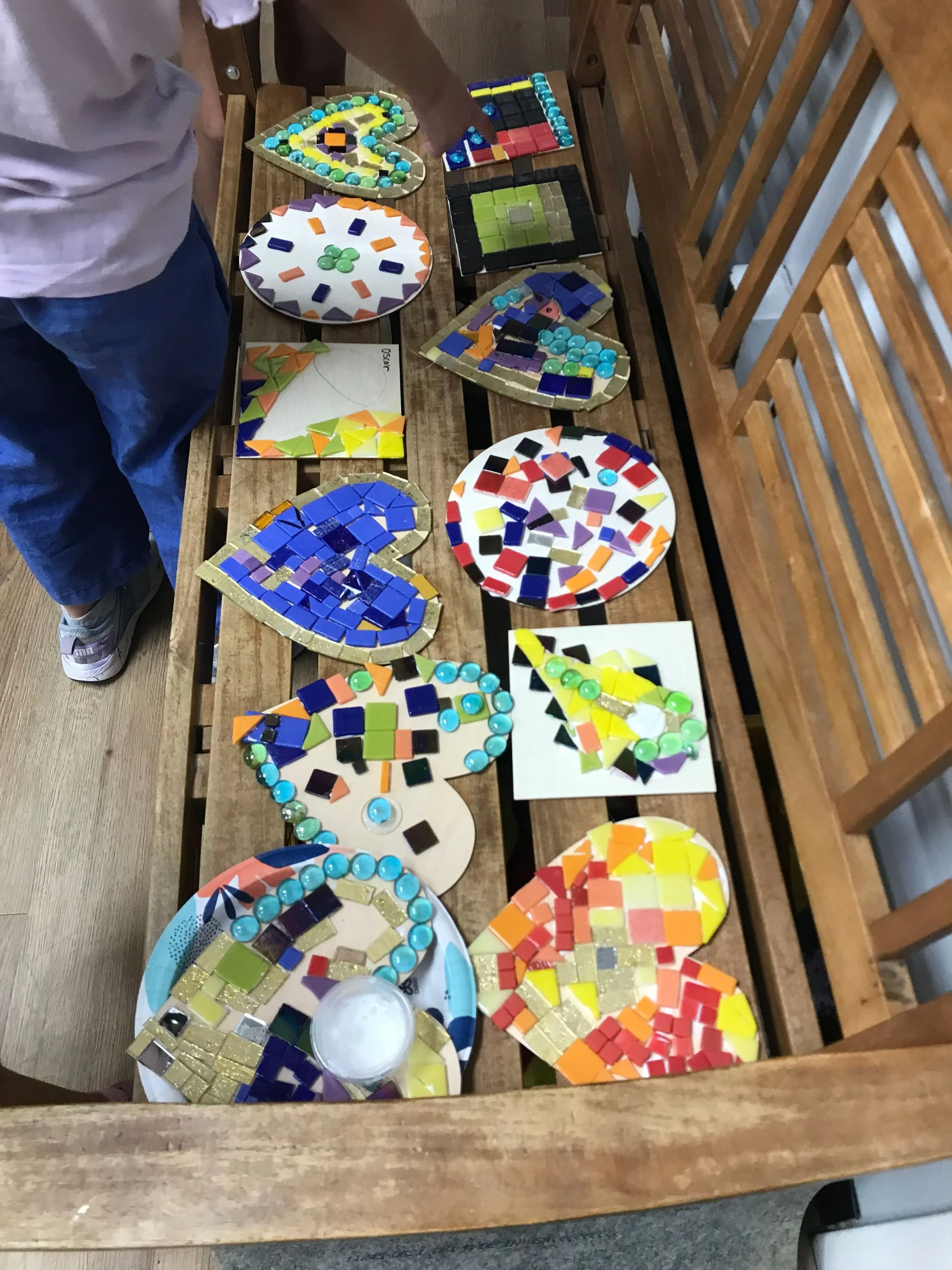 Finished pieces from mosaic heart classes