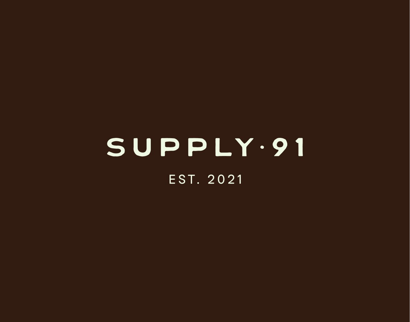 Barbershop brand identity design for Supply 91 in Oxford including typography, signage and retail interior branding