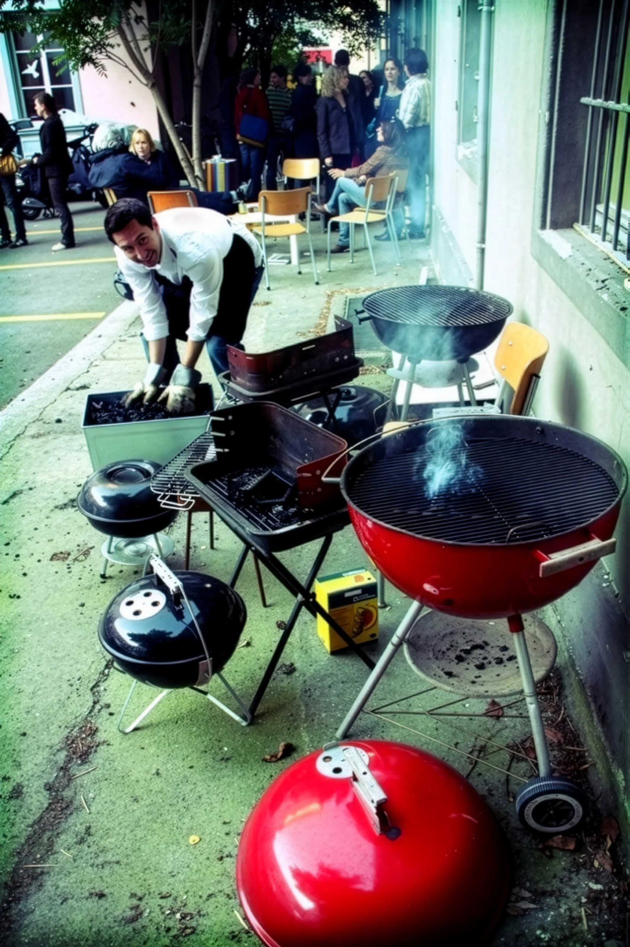 Art Title - Grill Mayhem, Merlin Zuni, photo of Merlin Zuni setting up for a BBQ performance