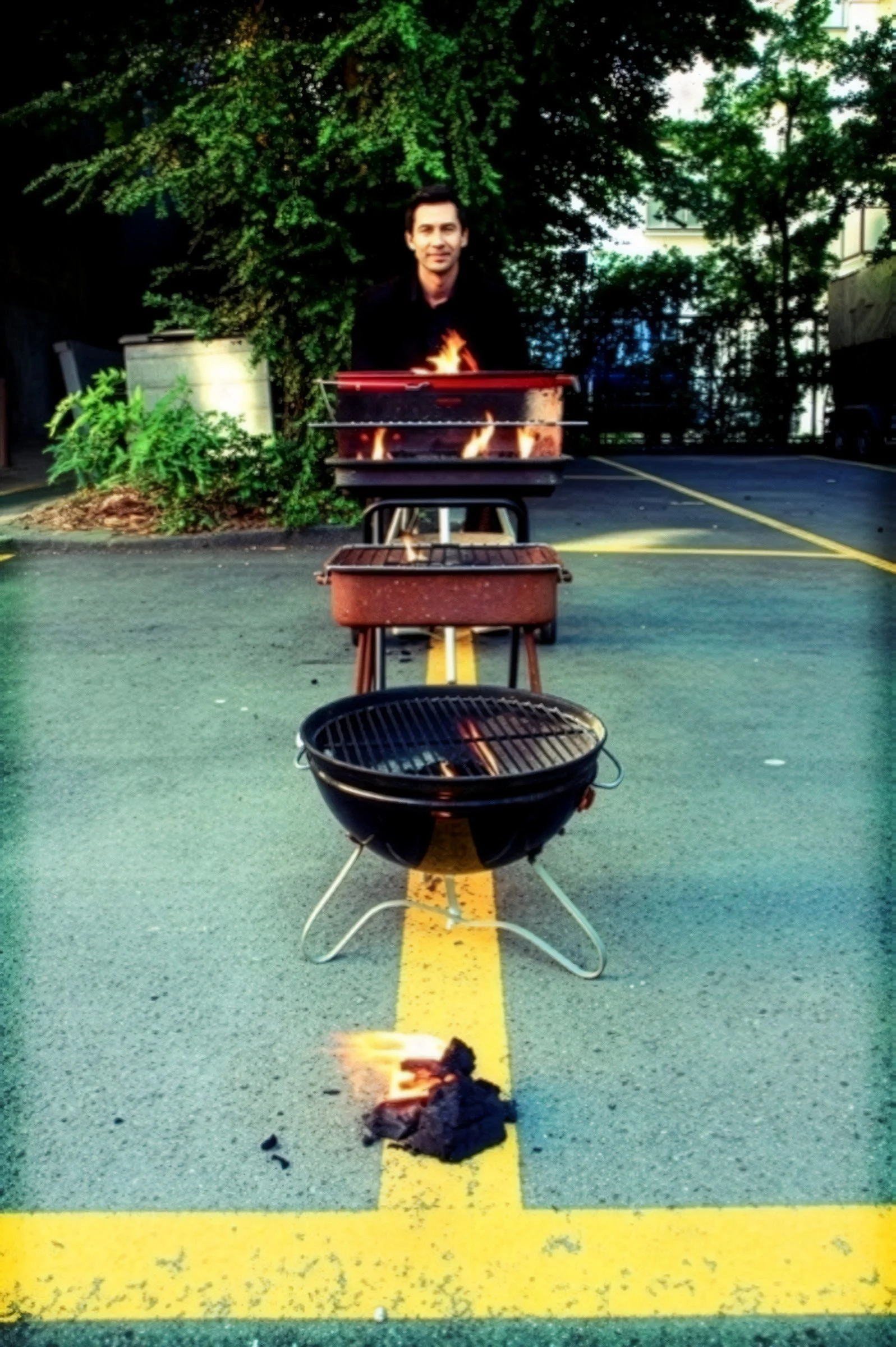 Art Title - Grill Evolution, Merlin Zuni, photo of mans move from first fire to the Modern BBQing man front perspective
