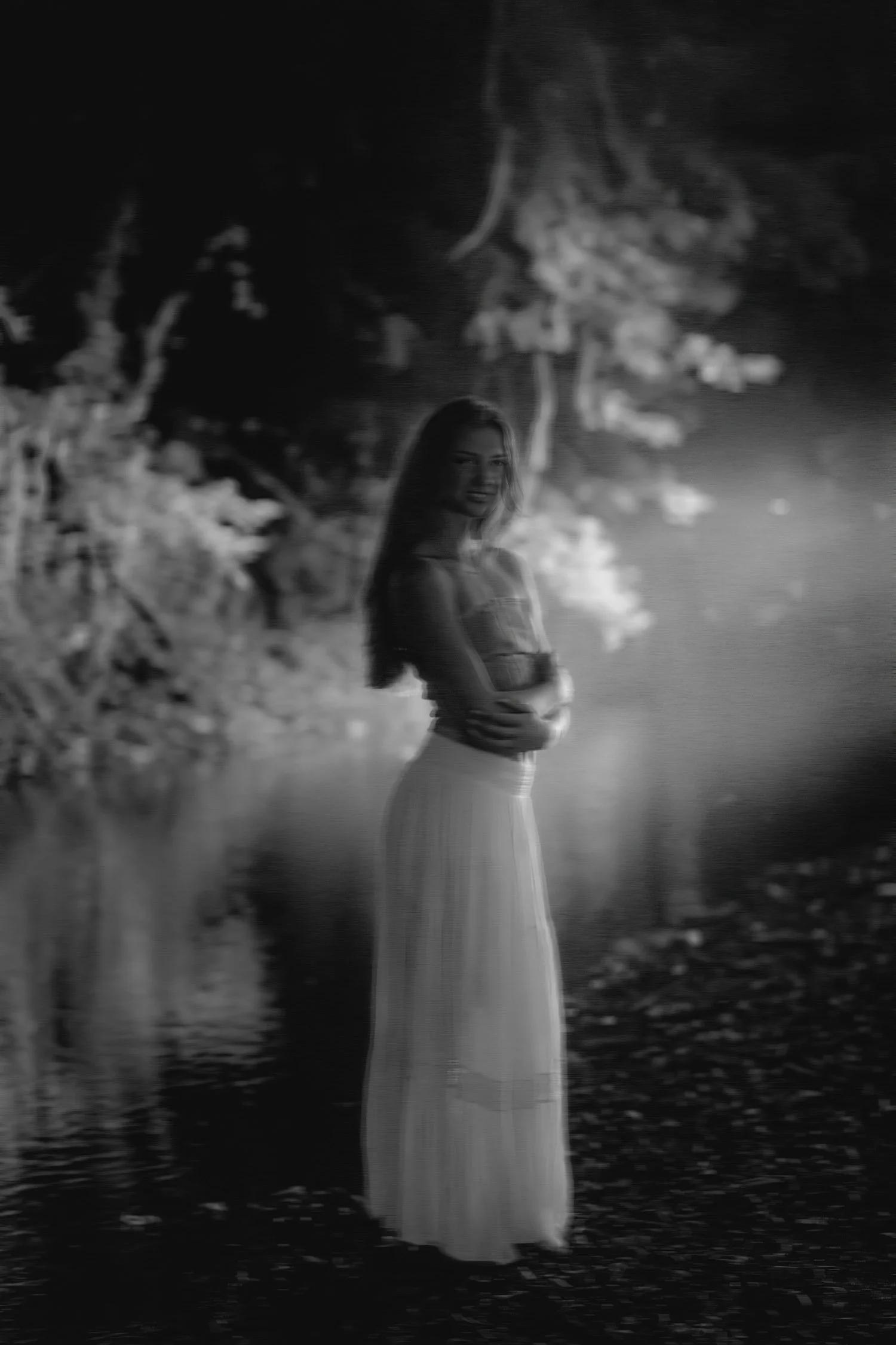 Black and white portrait of Eisley in the river, senior session near Bolivar, MO