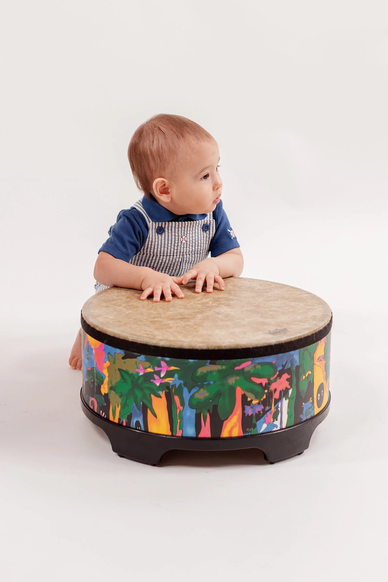 Winston resting both hands on his drum