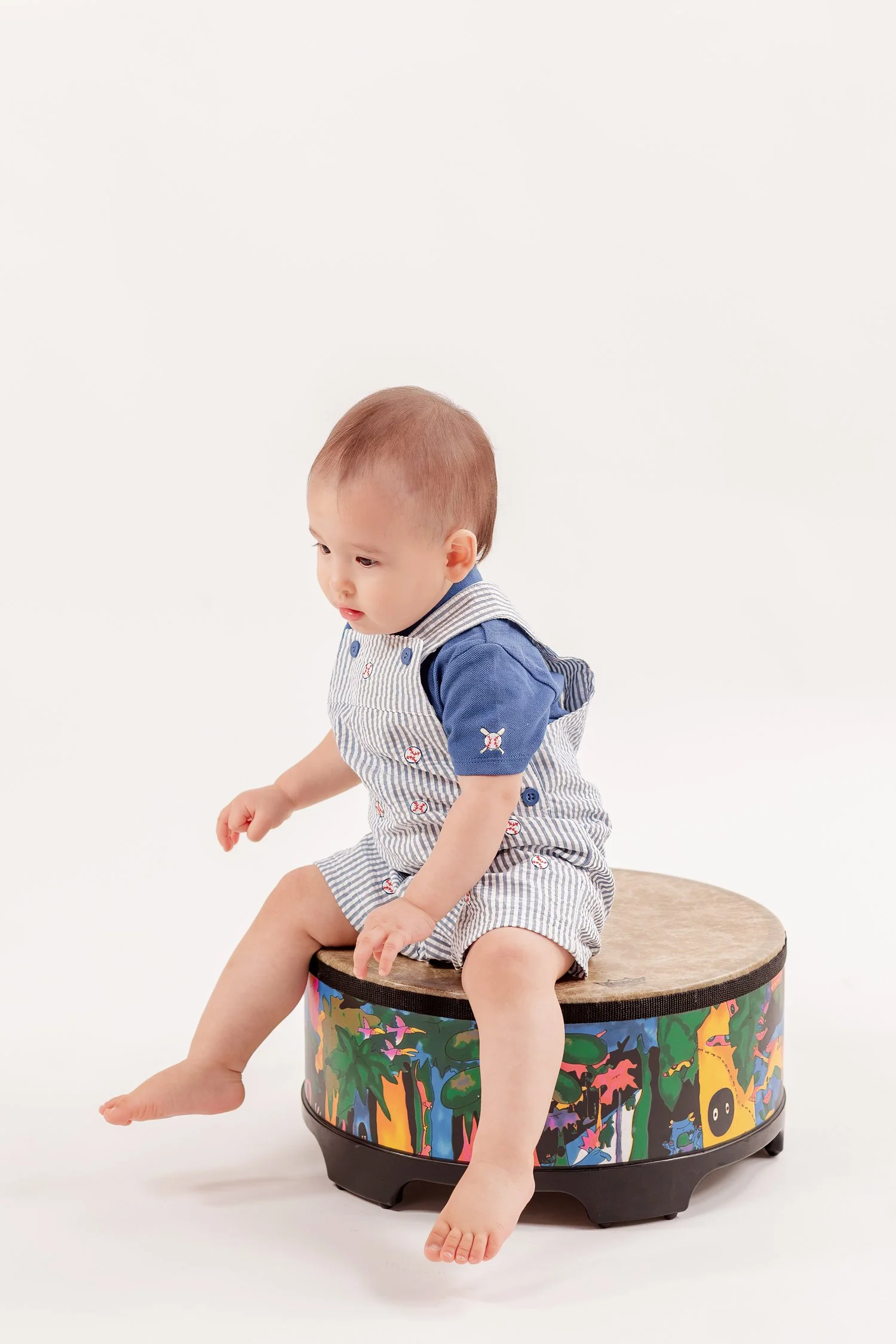 Side view of Winston sitting on the drum