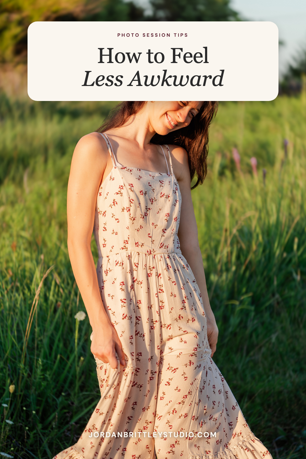 A senior smiles in a flower field for a post about feeling less awkward in front of the camera.