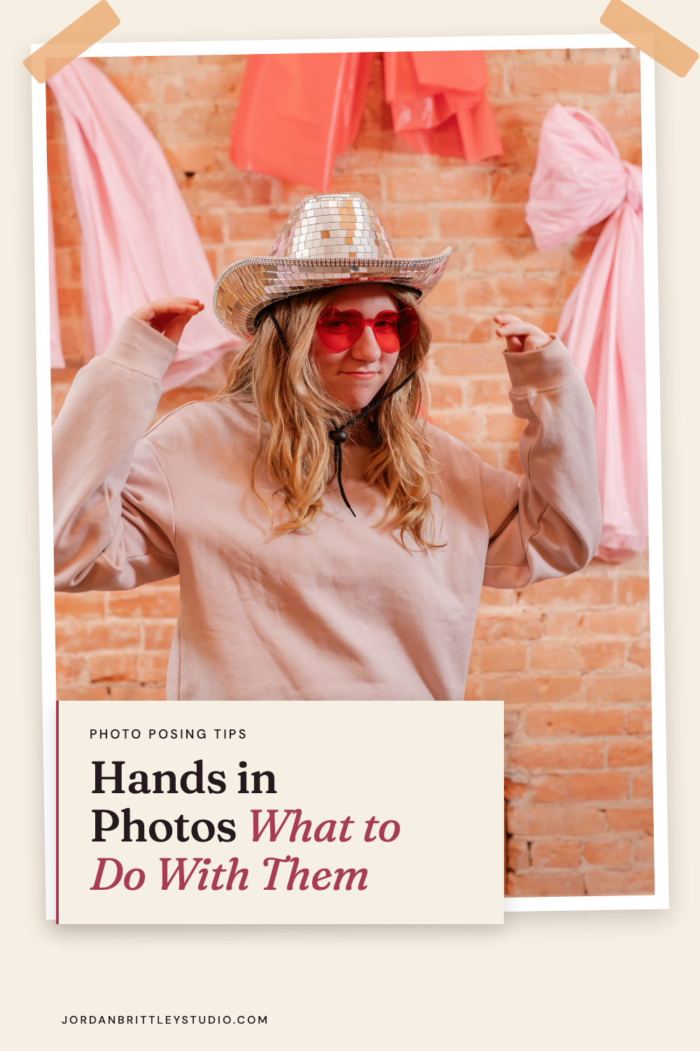 Senior wearing a mirrored cowboy hat with hands raised during a Jordan Brittley Studio photo session