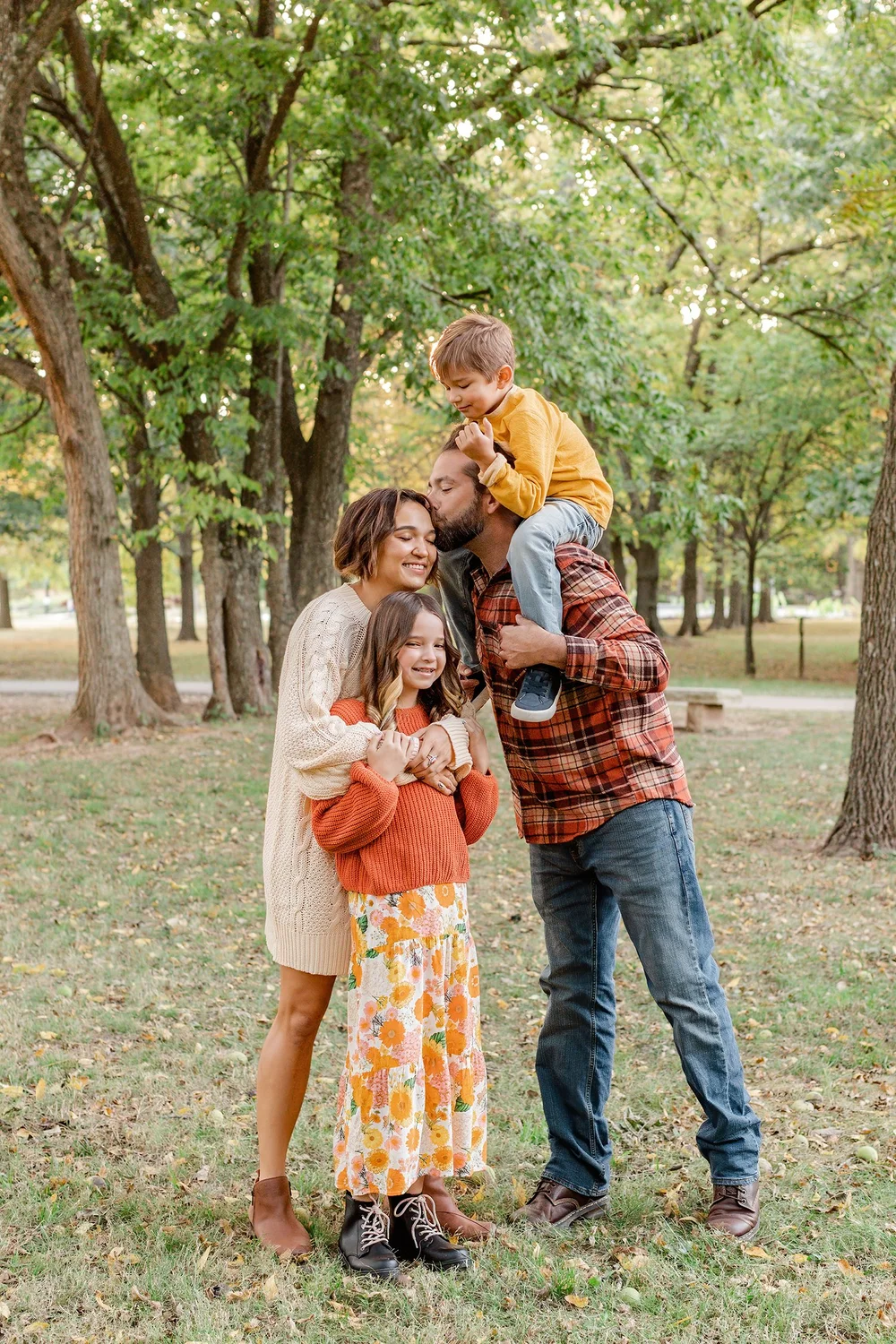 A family together outdoors during their photo session