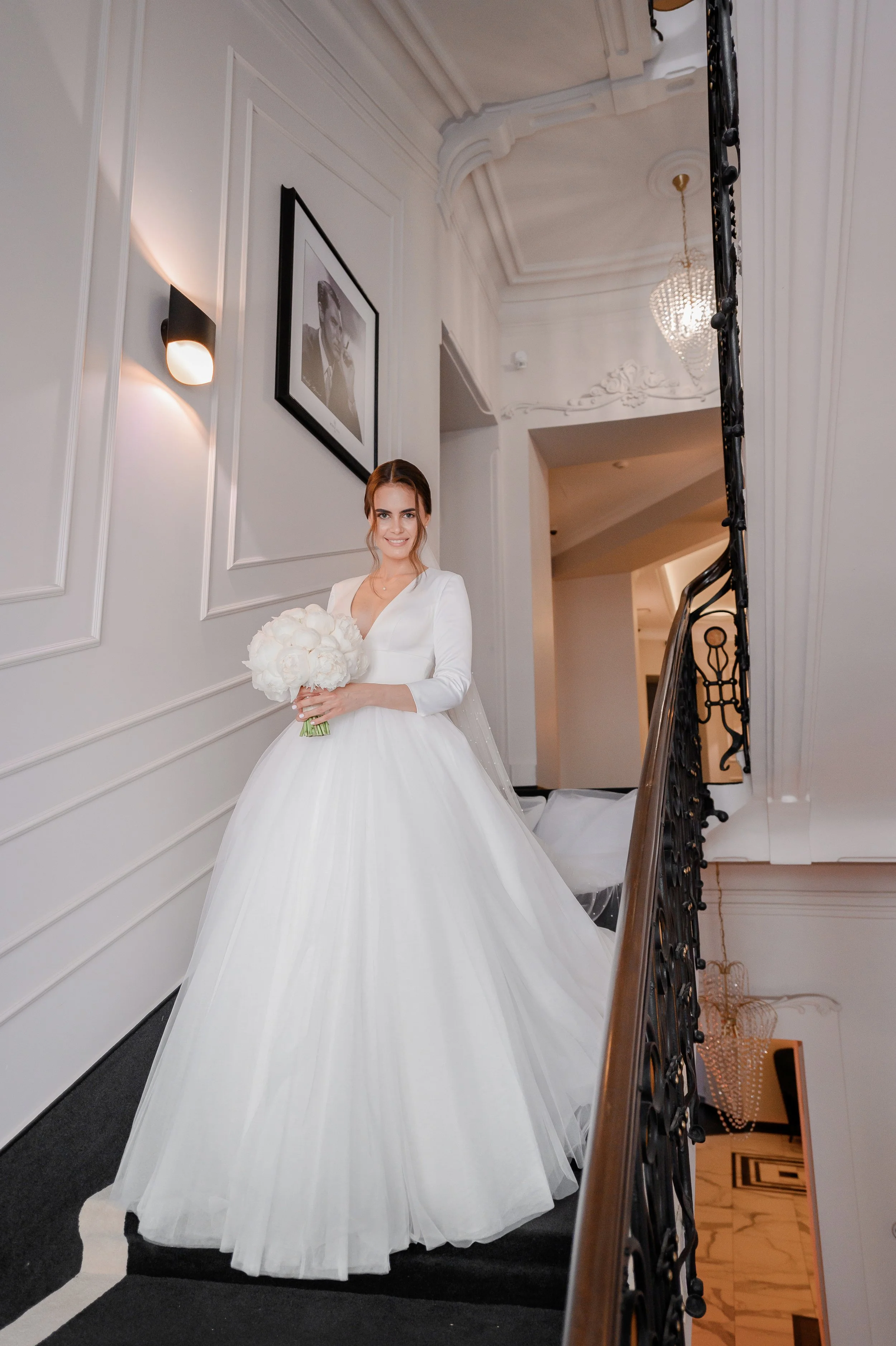 bride-with-bouquet-flowers-stairs.jpg