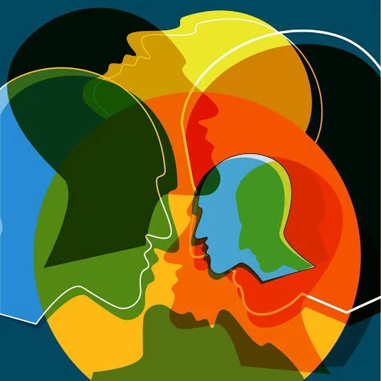 An illustration of many overlapping human heads