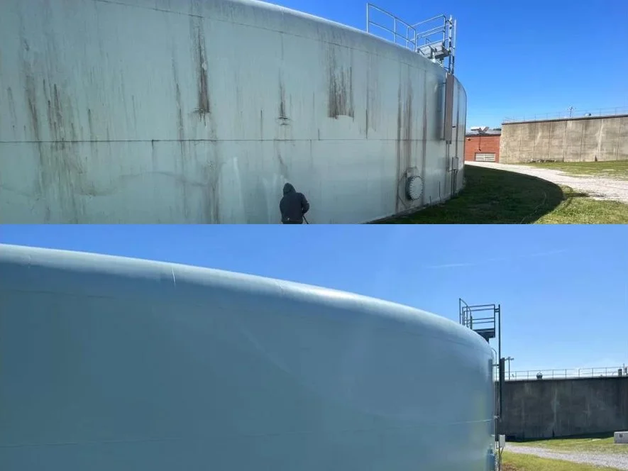 Side-by-side comparison of a large, weathered tank wall in the top photo and a clean, newly painted tank wall in the bottom photo, both outside next to a grassy area under a clear blue sky.