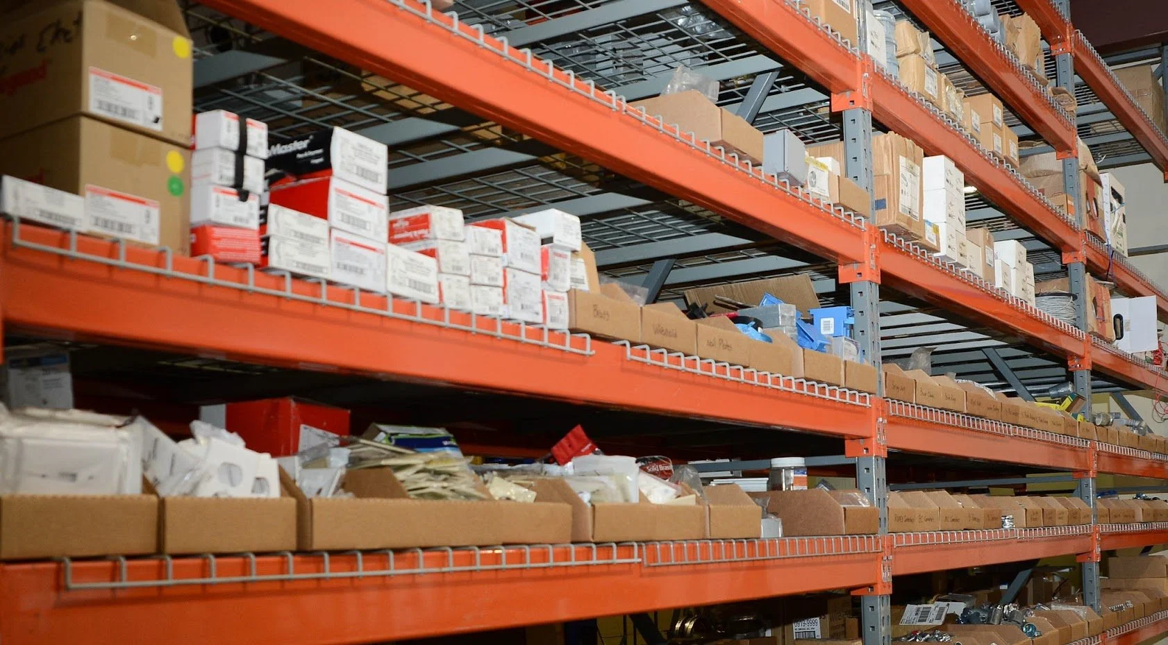 Higgins Electric warehouse shelves fully stocked