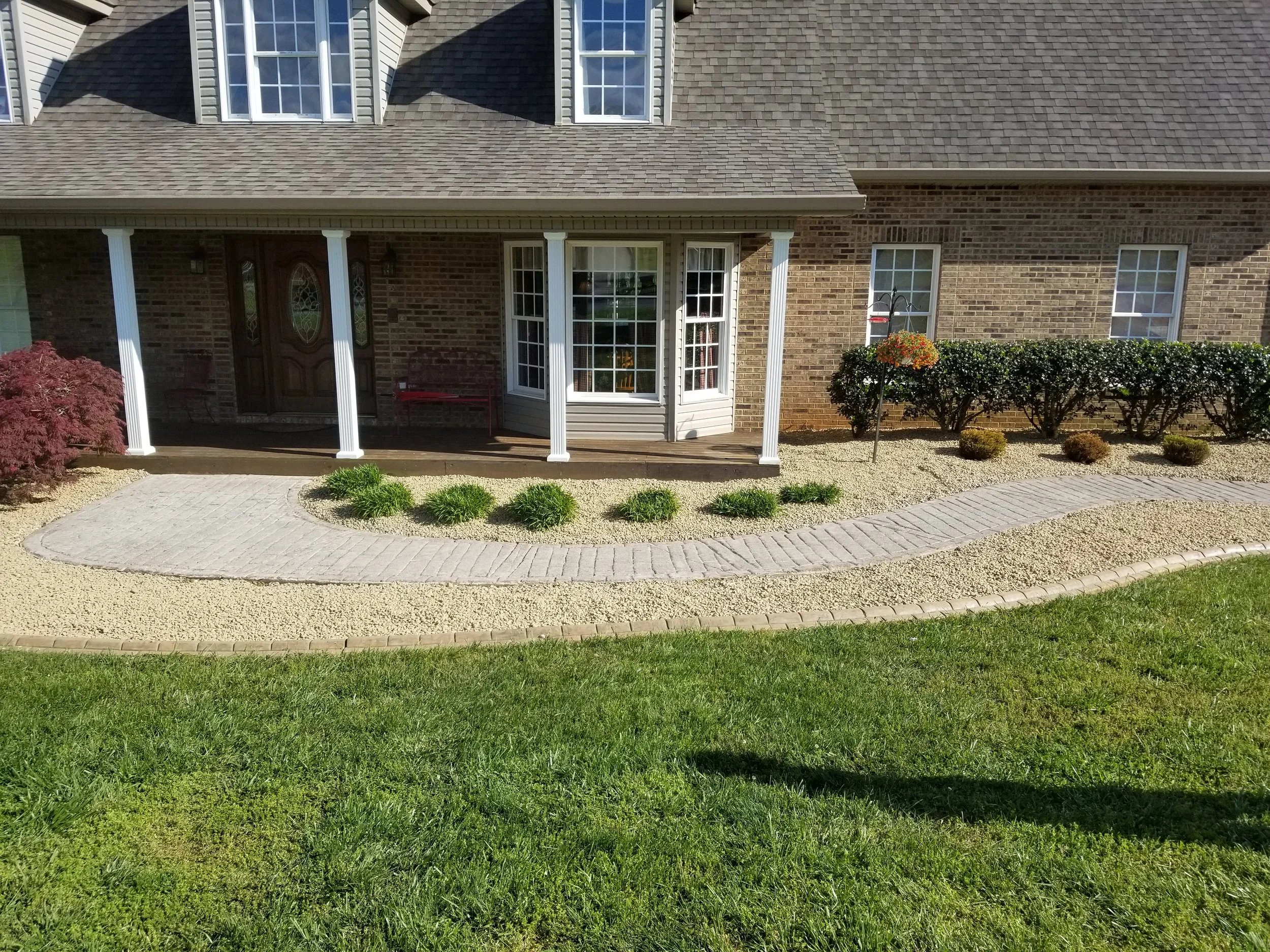 Landscape installation with garden beds and lawn — Tri-Cities Tennessee