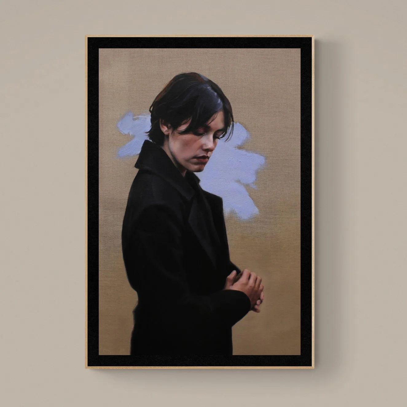 A woman with short dark hair and a black coat standing in front of a beige background with a painted purple cloud behind her.