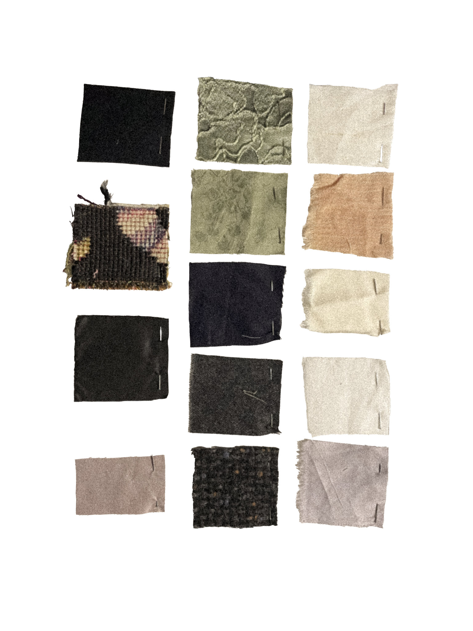 The image appears to contain various fabric swatches or small rolled fabrics of different colors and textures arranged on a surface.