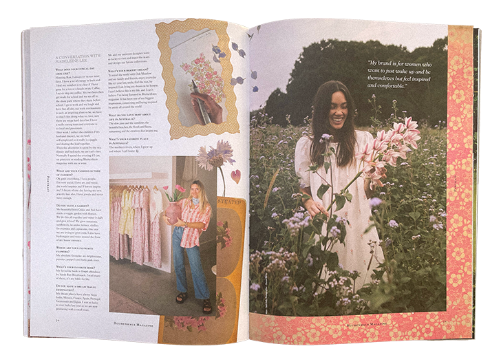 Open magazine spread featuring a woman in a pink shirt holding clothing at a boutique and another woman smiling in a garden surrounded by flowers.
