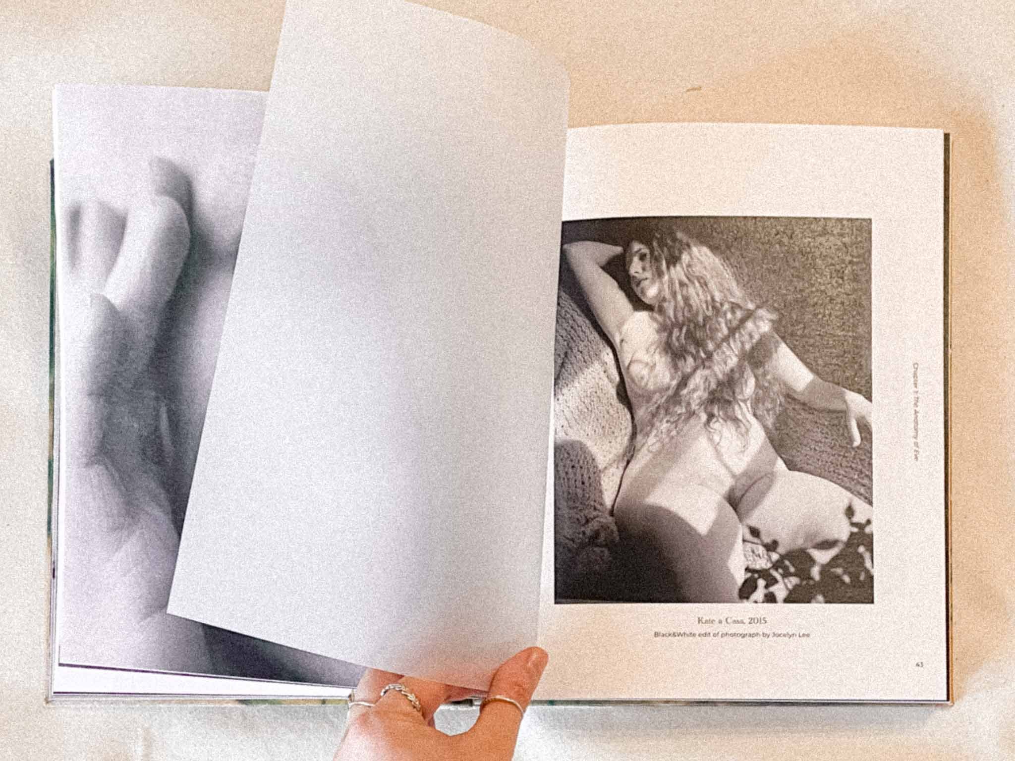 Photograph of a page displaying two black and white photographs of a woman with long curly hair posing, with text below indicating 'Kate'a Class 2015' and credit to the photographer Lucy Lee.