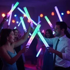 Long exposure photograph of colorful neon lights creating a spiral pattern against a dark background.