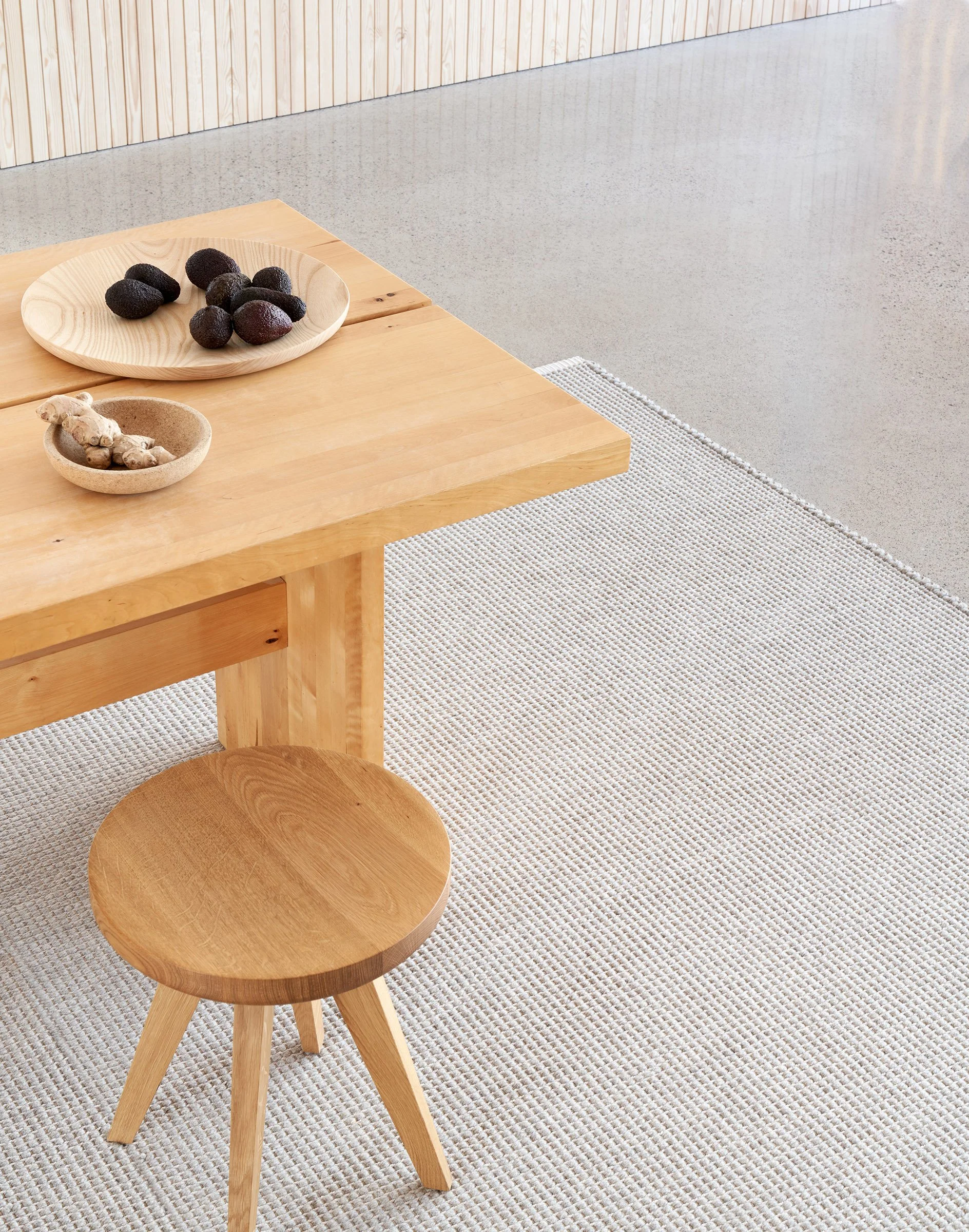 Minore carpet under the wooden table