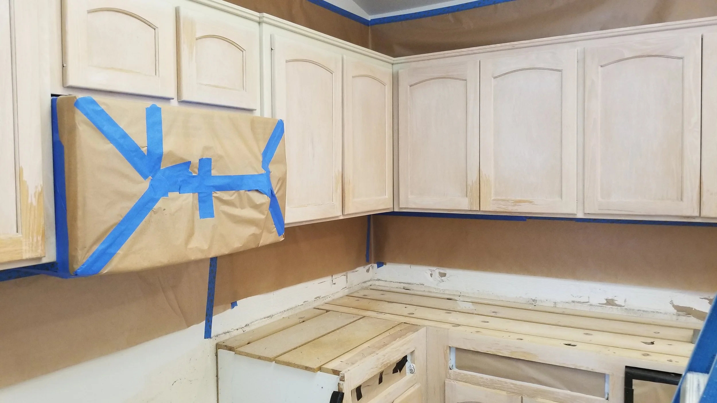 Kitchen cabinet prepped for paint. Handyman in Irvine Ca.