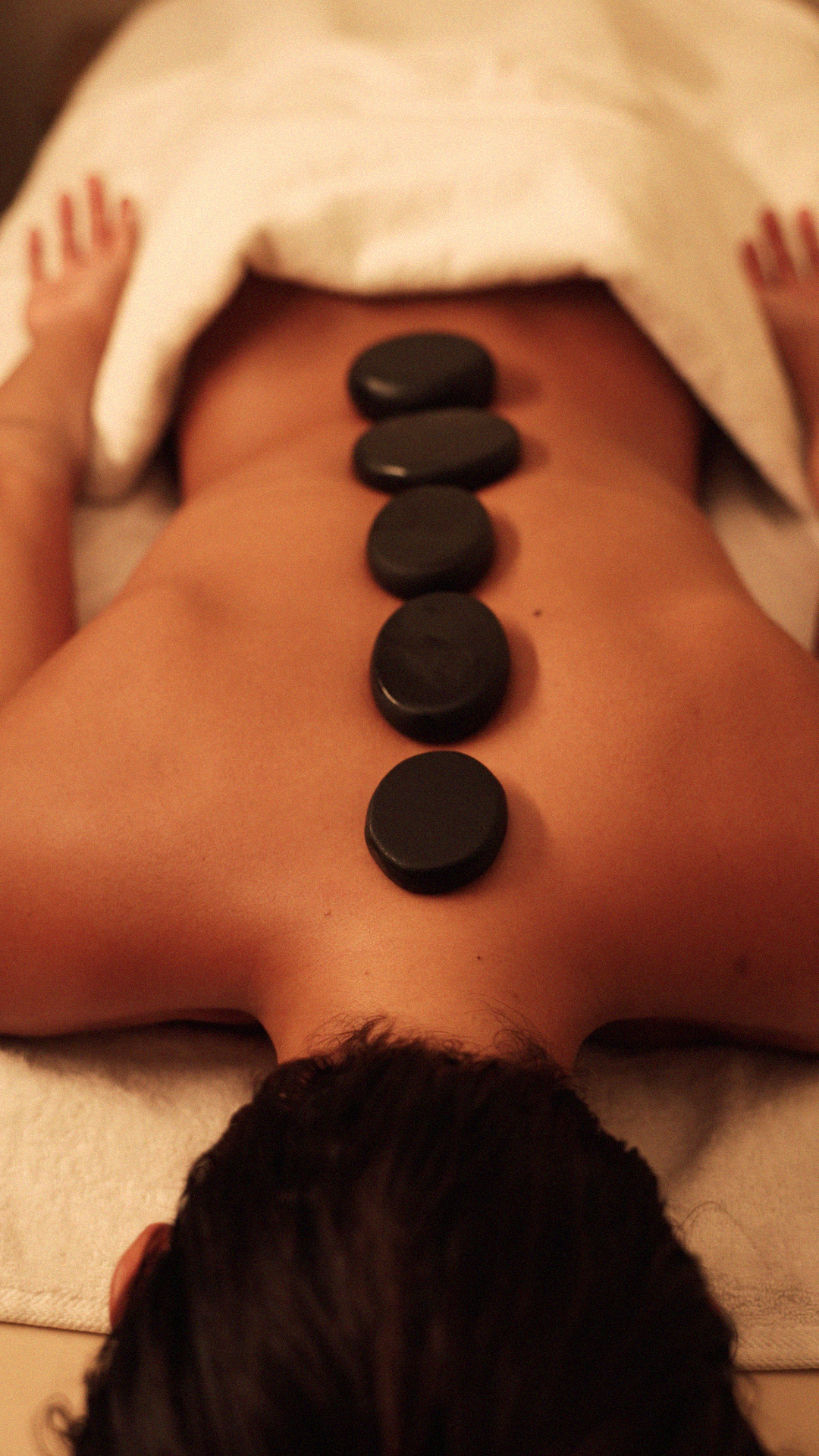 Hot stone massage at Bliss Spa