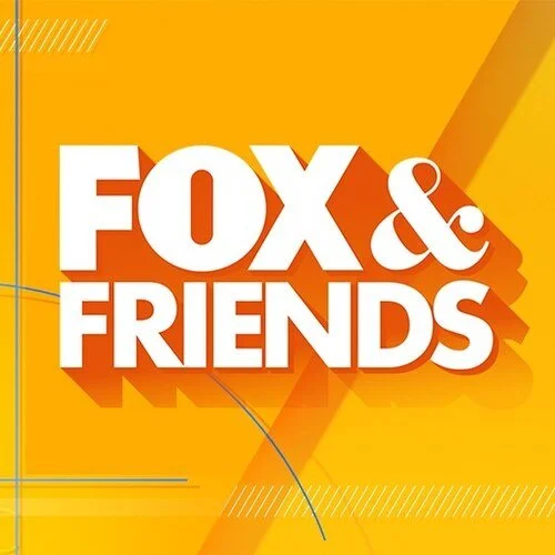 Logo for the TV show "Fox & Friends" with bold white text on an orange and yellow background.