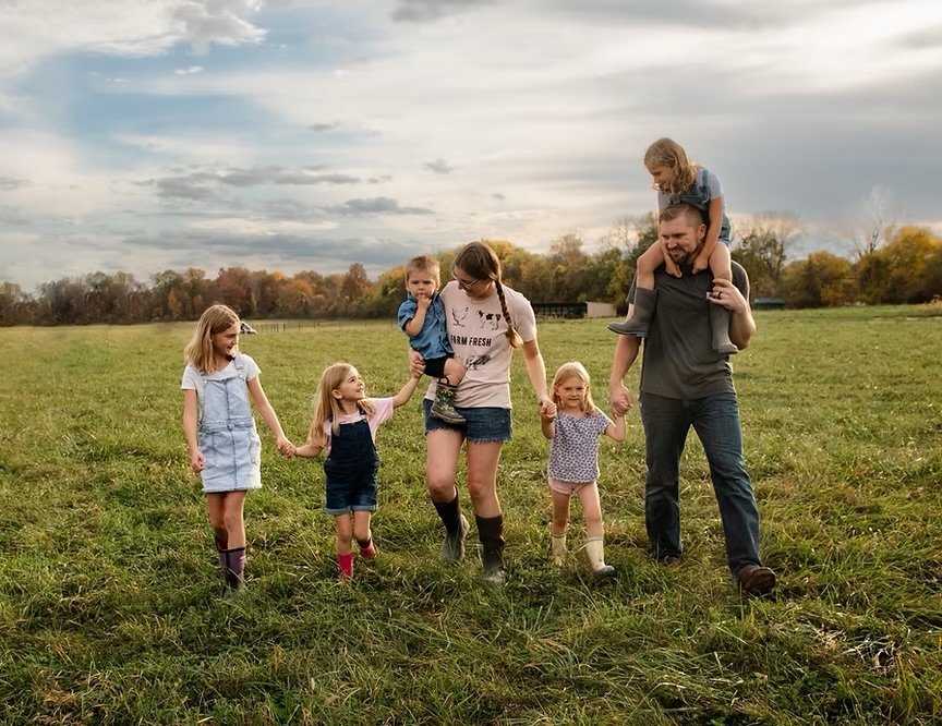 Megan Luke Freshwater on their farm with the family