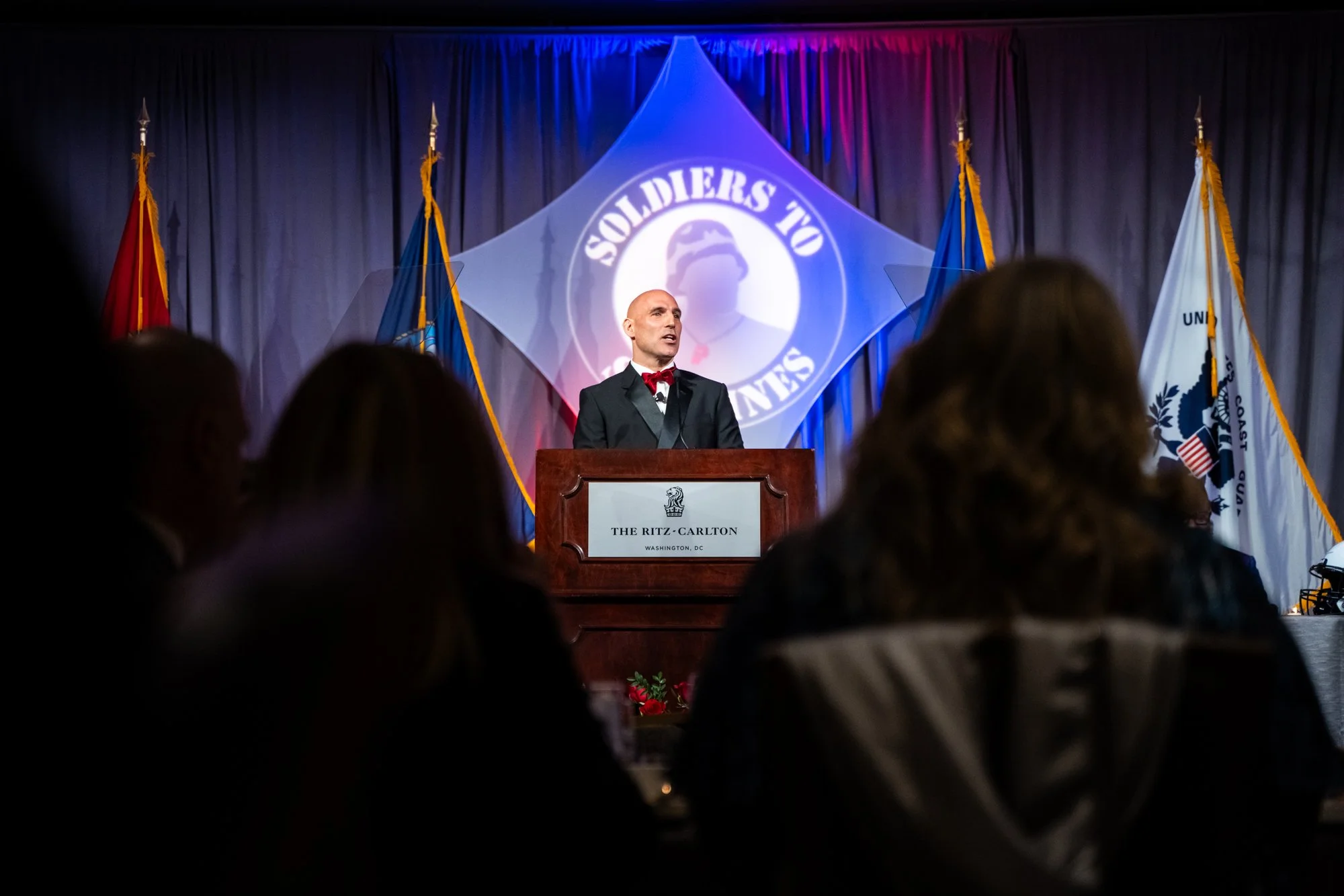 Harrison Bernstein speaking at Soldiers To Sidelines Gala