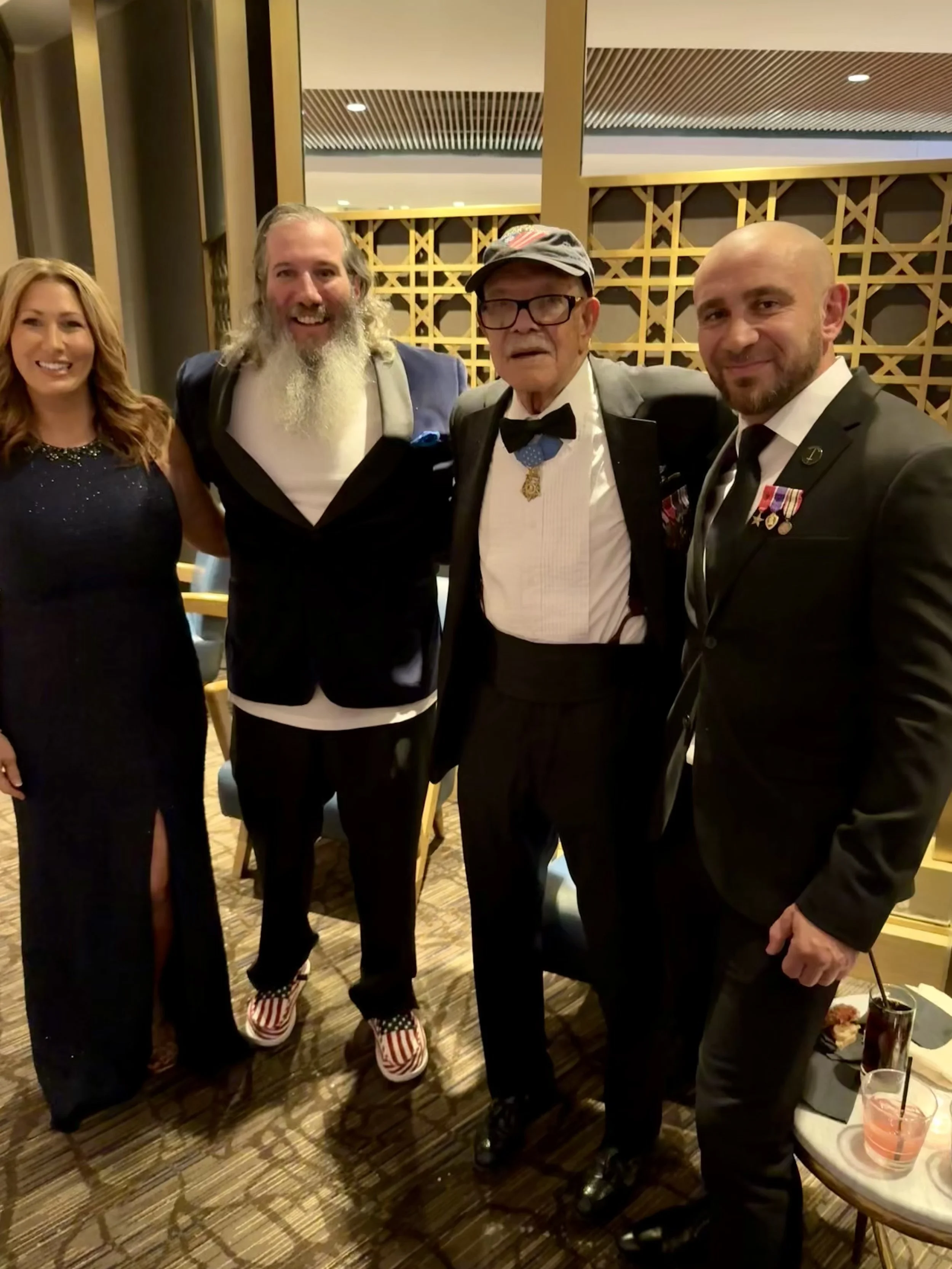 Corrie and Herb Thompson, Medal of Honor Recipient Ret. Col. Paris Davis, and Pasha Palanker 