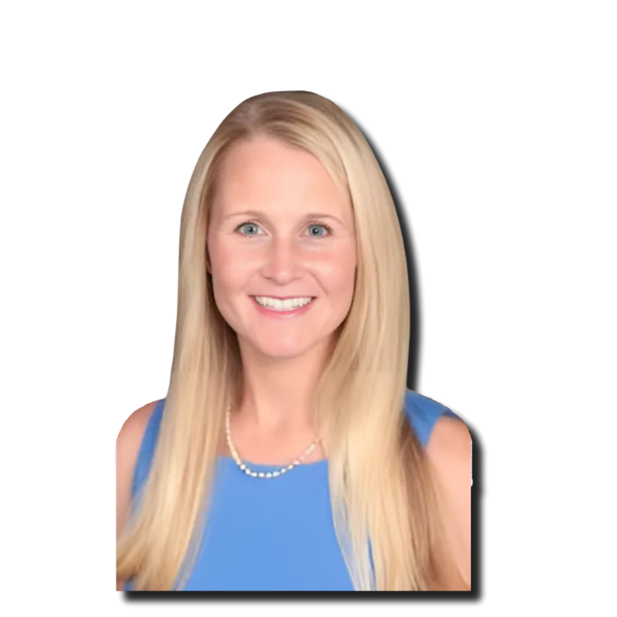 A smiling blonde woman with blue eyes wearing a sleeveless blue dress and a pearl necklace, posed against a plain black background.