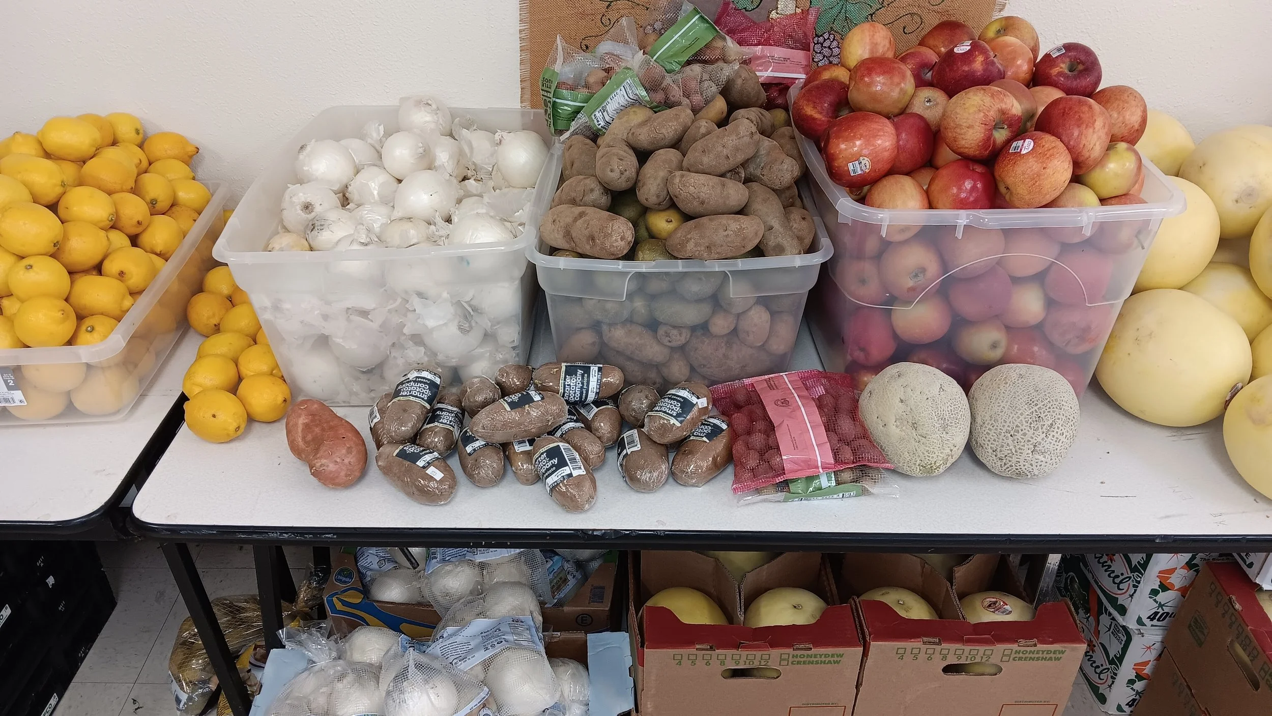 Bins holding onions and potatoes