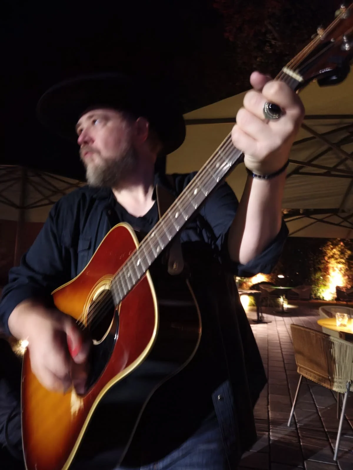 Jack Gregori playing guitar.